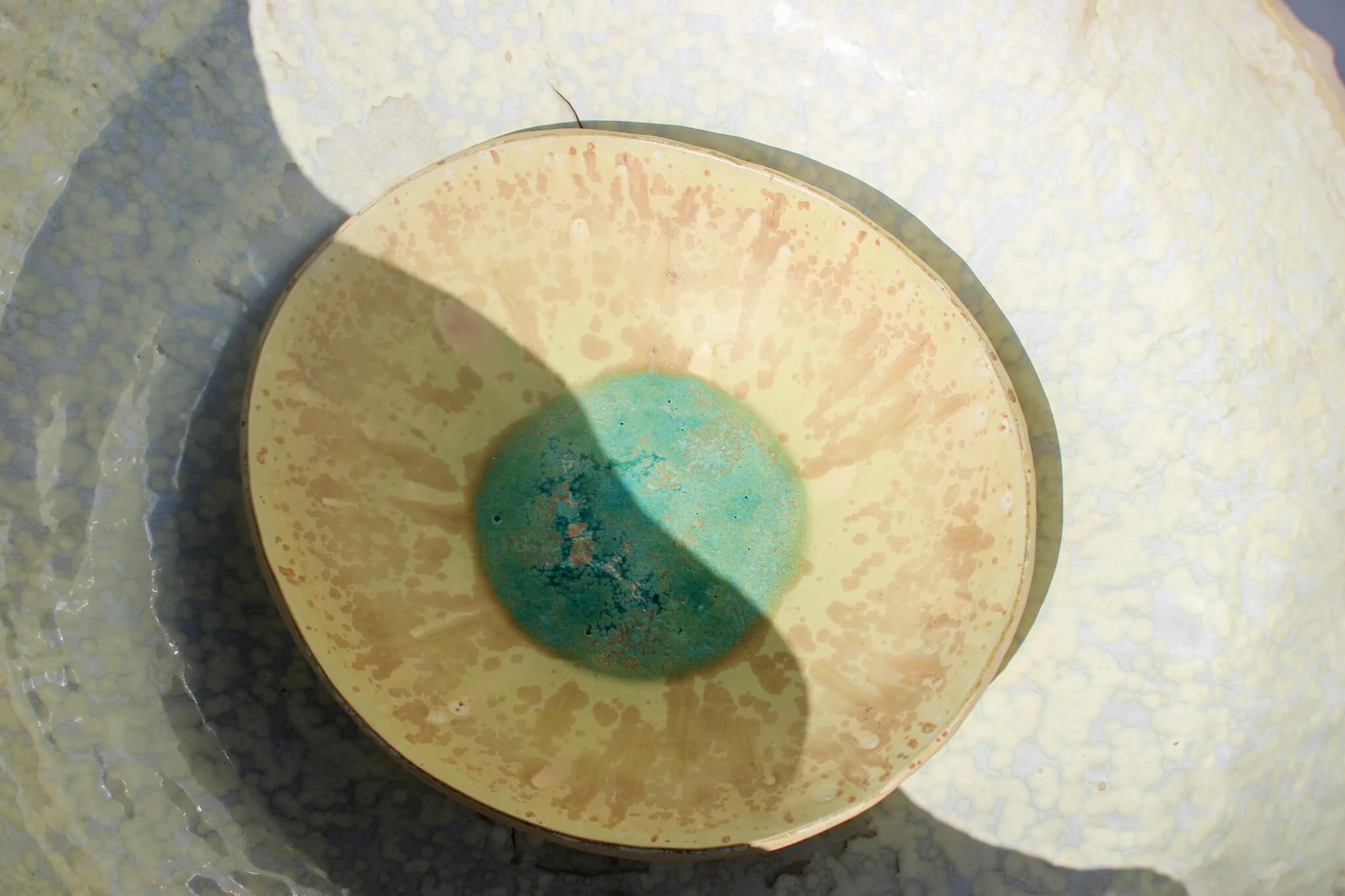 Interior view of the AVALOKITESHVARA giant ceramic Vessel containing crystalline glaze, created by multidisciplinary artist Noemie Marmara, founder of intimate immensity®