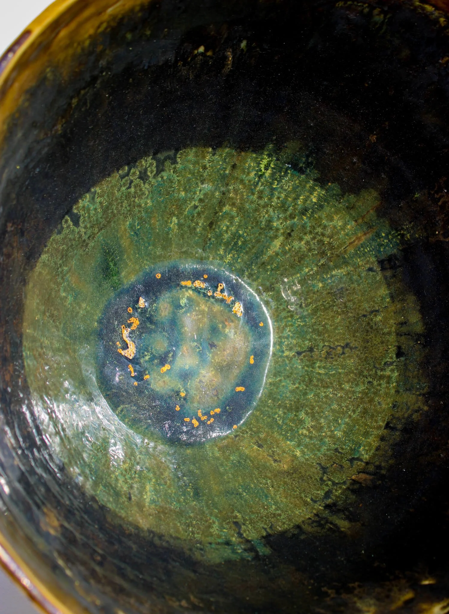 Interior view of the IRIDESCENT VESSEL from the Diamond Being Collection of contemporary ceramic works created by Noémie Marmara. An open vessel created from porcelain and stoneware fireclay, containing crystalline glazes, copper and gold.