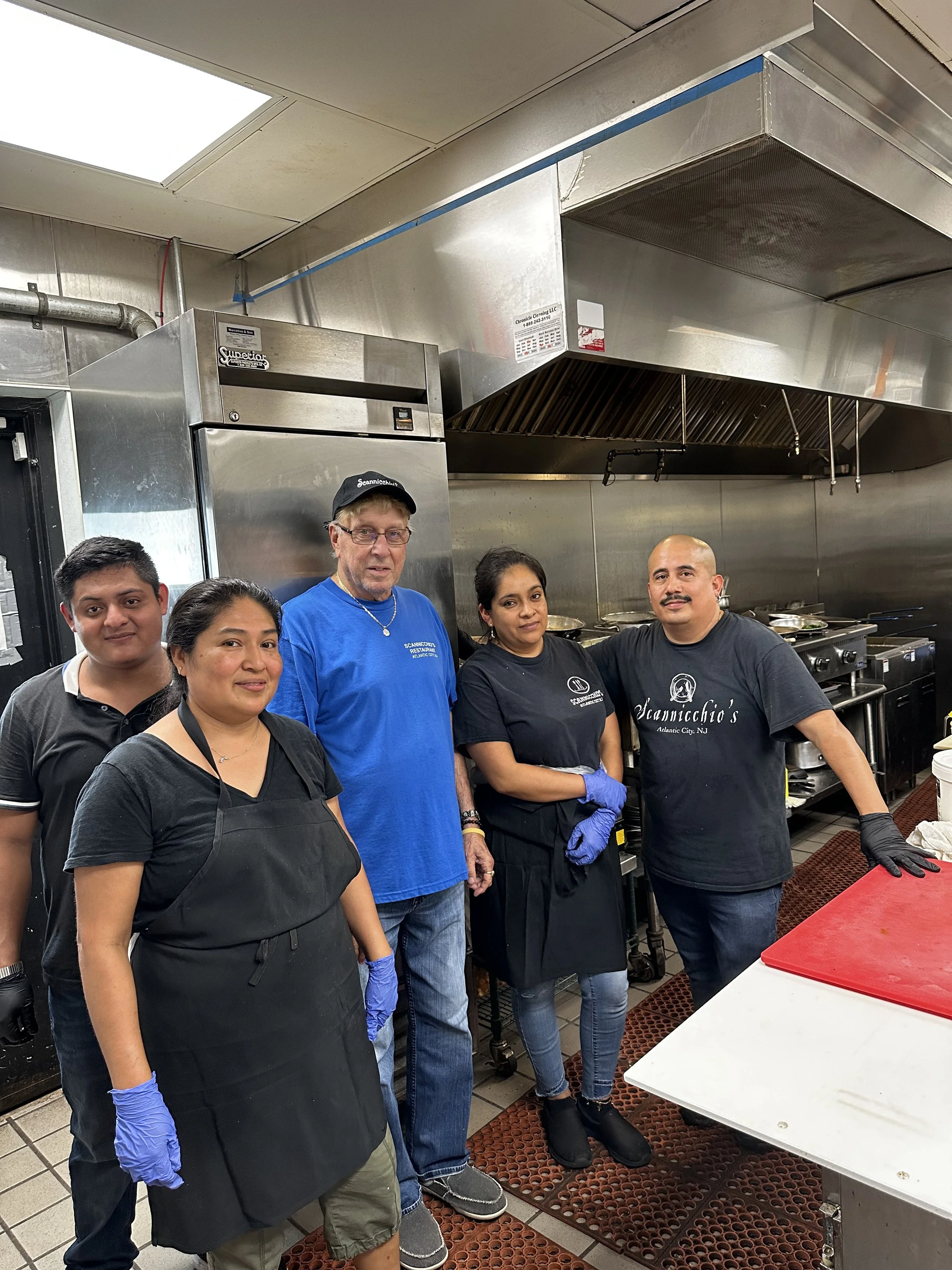 Owner John Varalli and Kitchen Staff