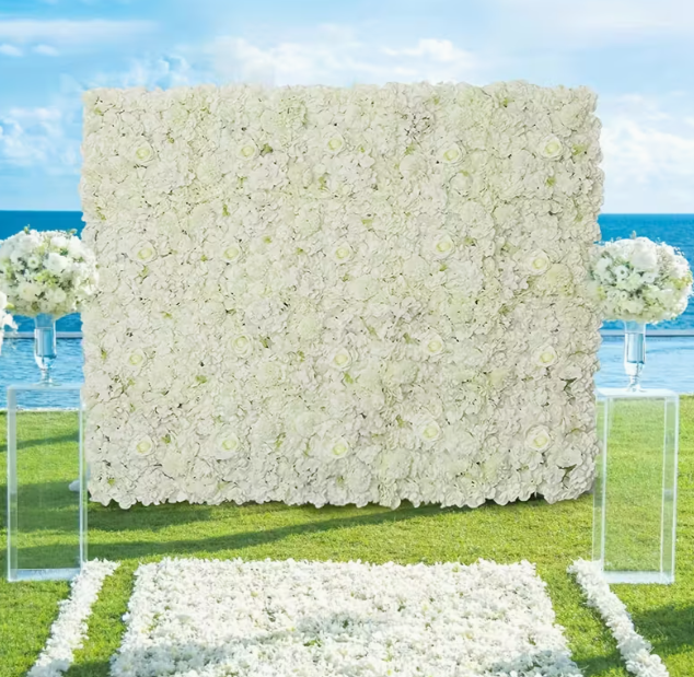 A large floral backdrop made of white flowers with a neon sign that reads 'Better Together' in cursive.