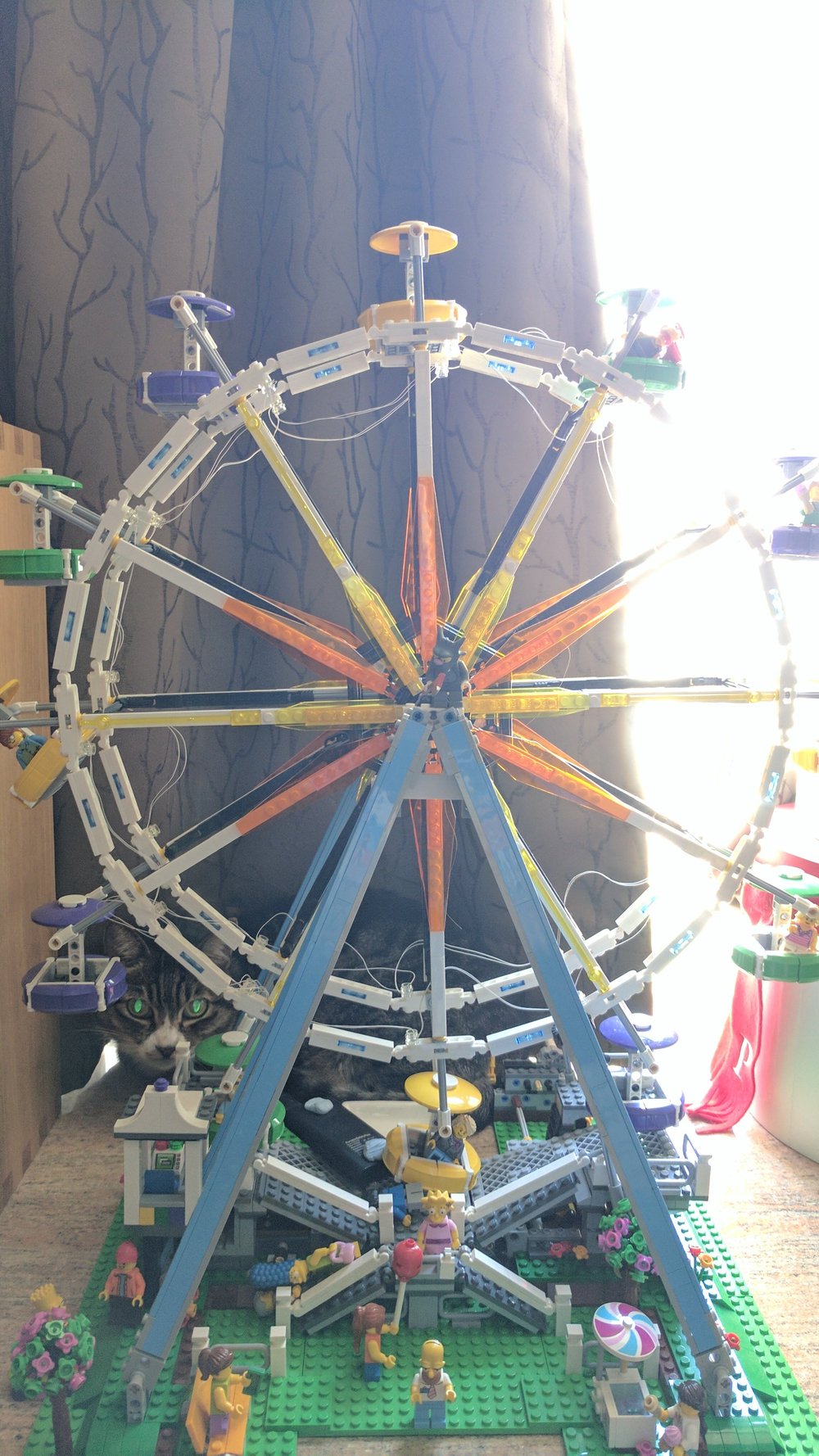 Jyn hiding behind her favourite Lego ferries wheel (Copy)