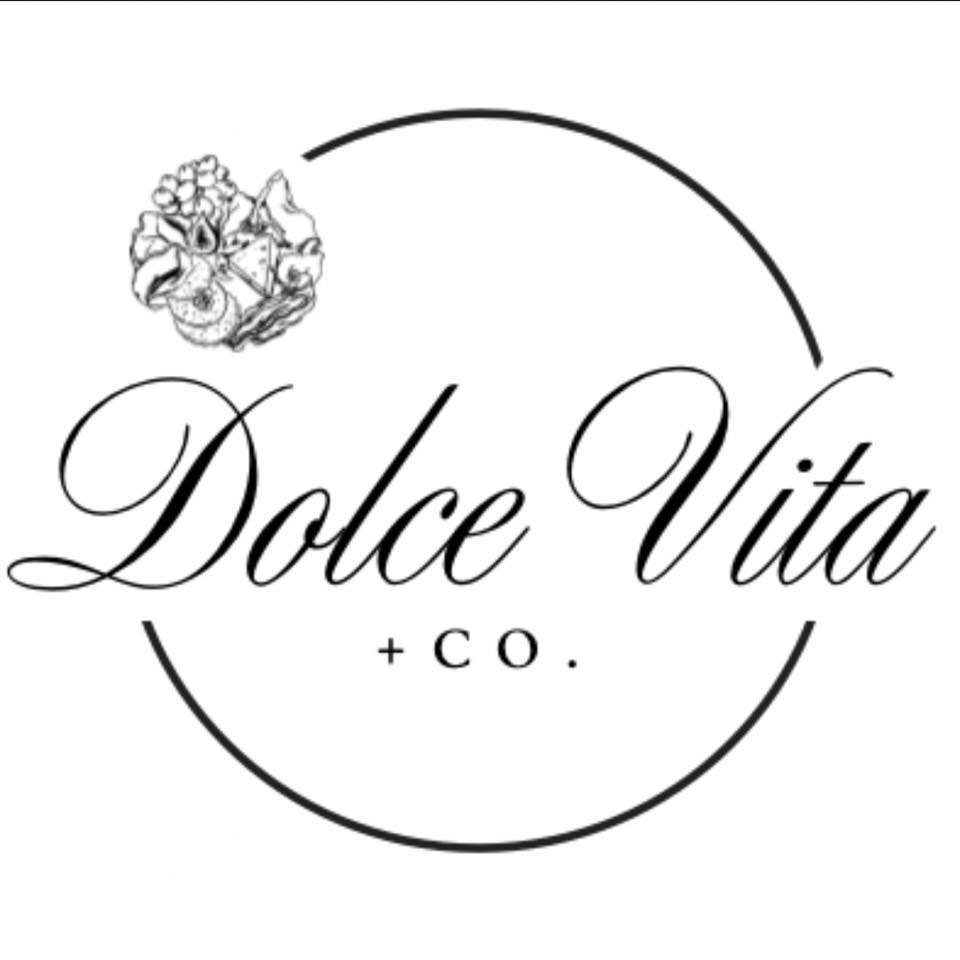 Black and white logo for Dolce Vita + Co., featuring stylized text and a detailed sketch of grapes and flowers in the top left corner.
