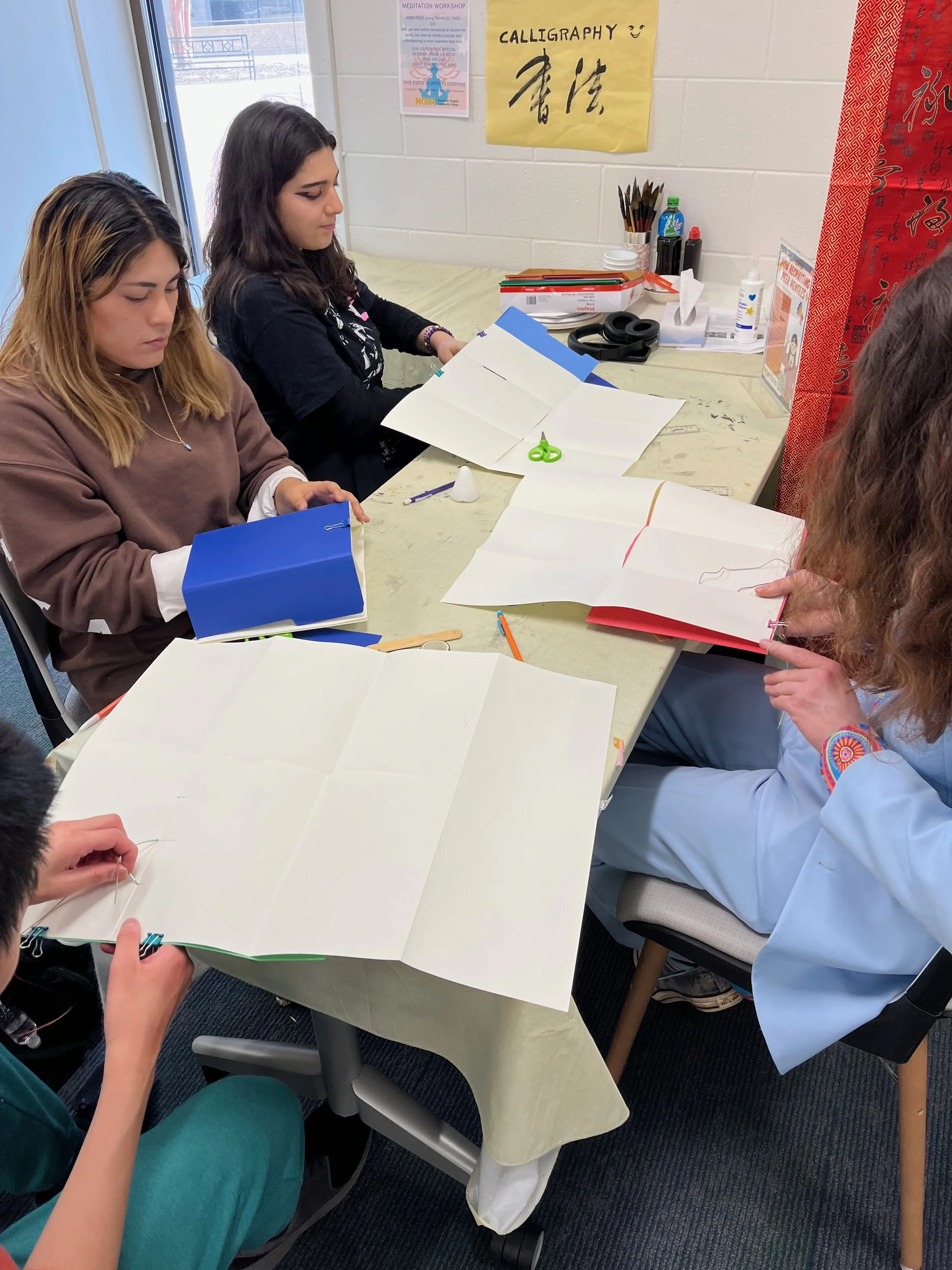 Session 6: “Spring Break Sketchbook” - Right before spring break students learned origami book making techniques mixed with West Asian book arts techniques to make a sketchbook. It included a pencil too. 