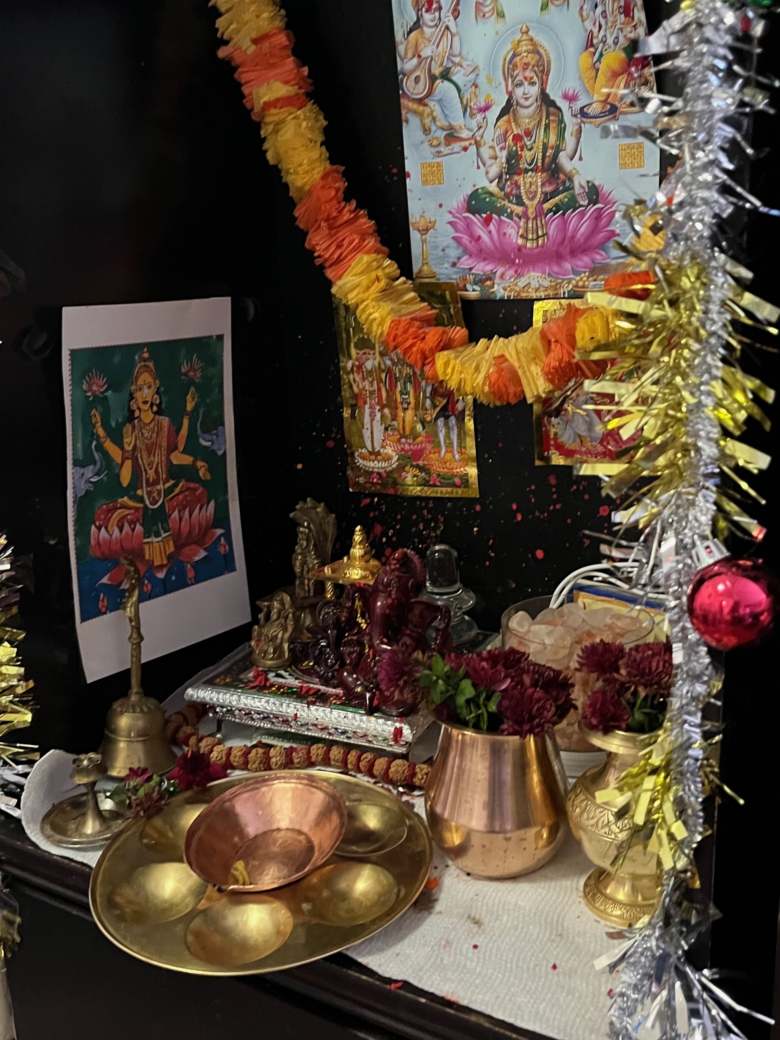 Sarita had asked for a printout of the painting of goddess Lakshmi, done for our book by Amar Shekdar. It was so wonderful when Sarita's daughter showed me how they had added it to their shrine!