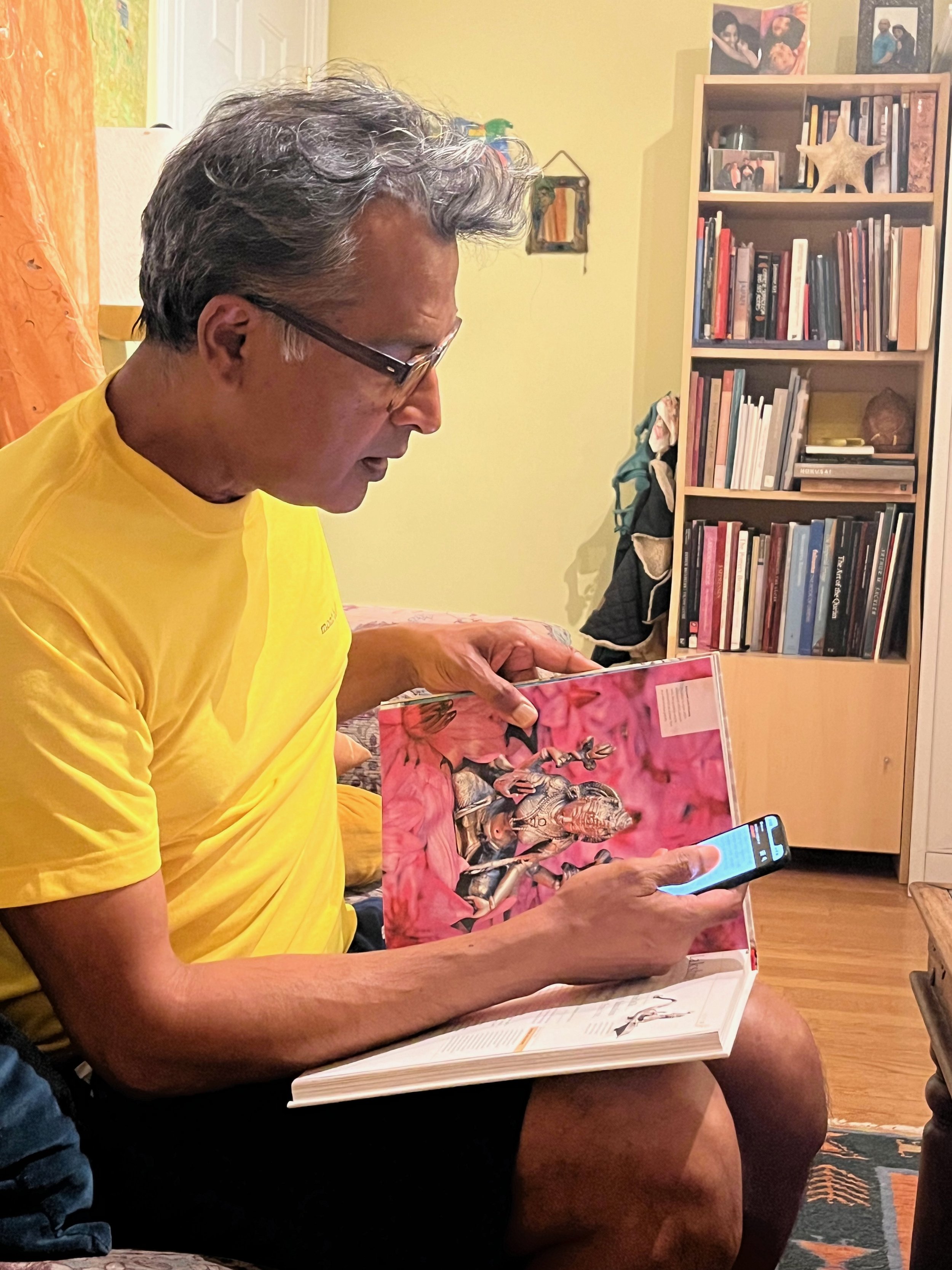 Amar Shekdar studies my new book, Shakti, looking at various ways Lakshmi is depicted in Indian art. He is an old friend and was visiting from New Zealand. He used to paint a lot when he worked as an art teacher and when we chatted over FaceTime he w