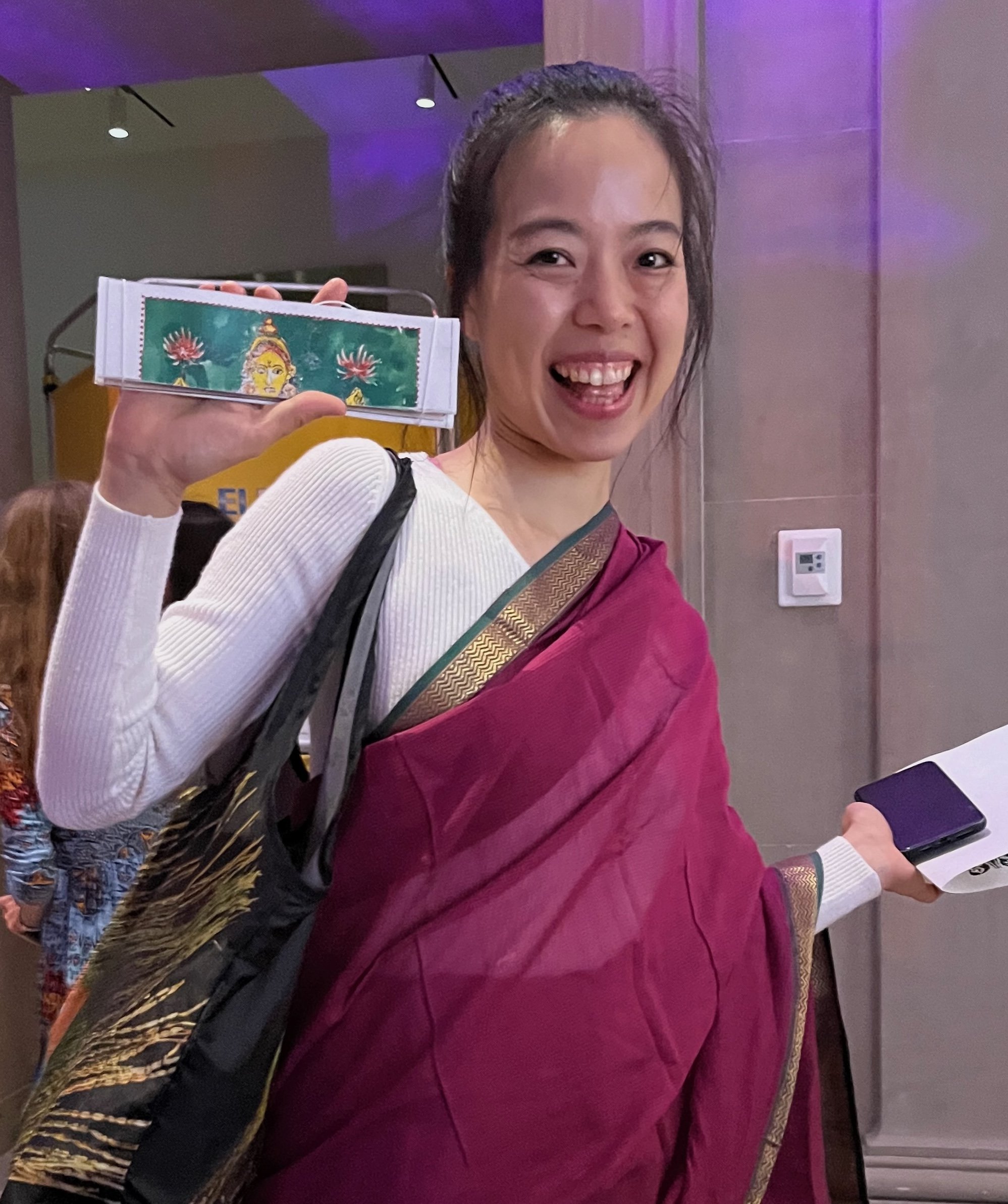 She wore the sari herself! Then brought her friends to make the book