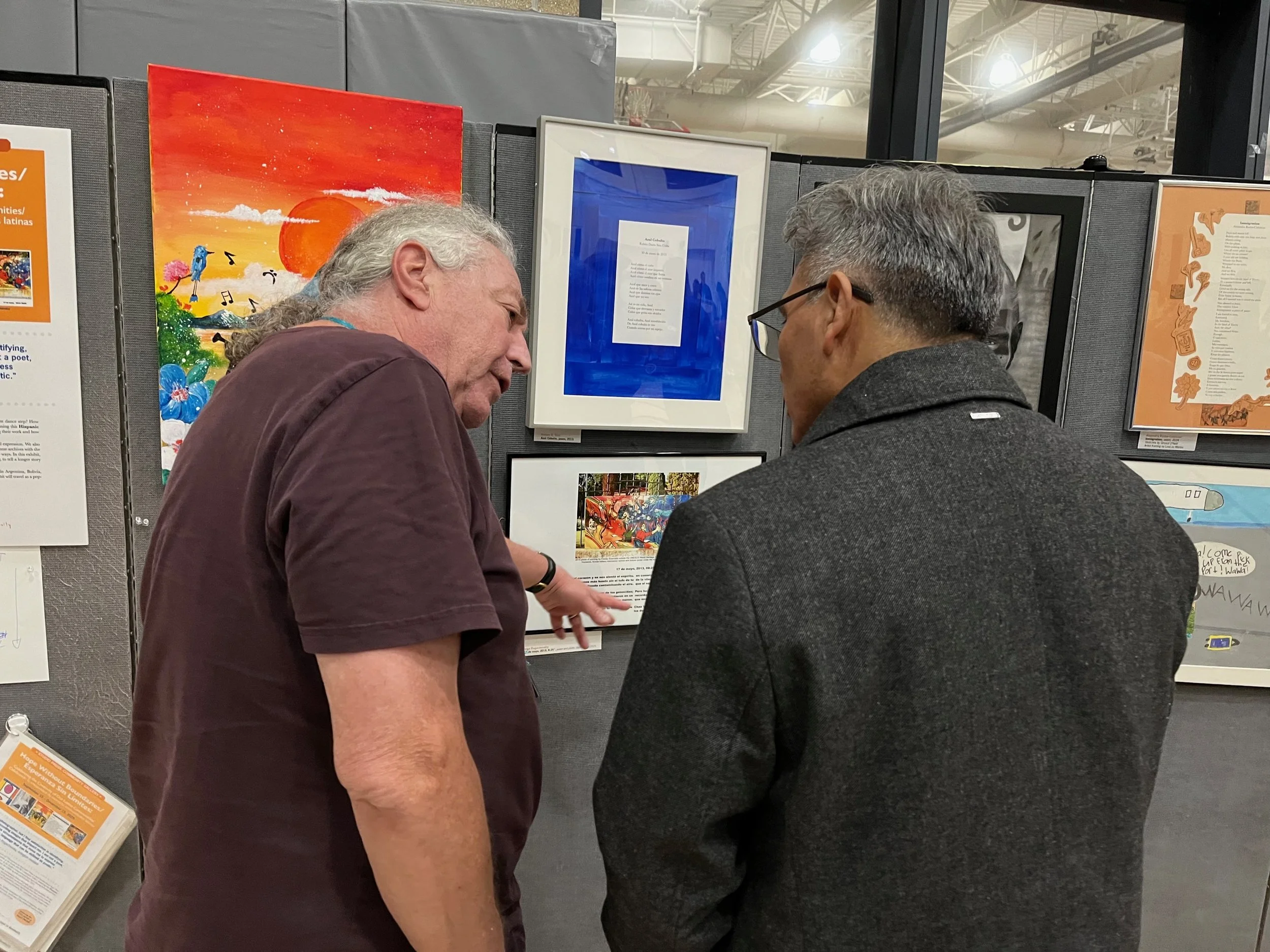 Jorge engages with a visitor