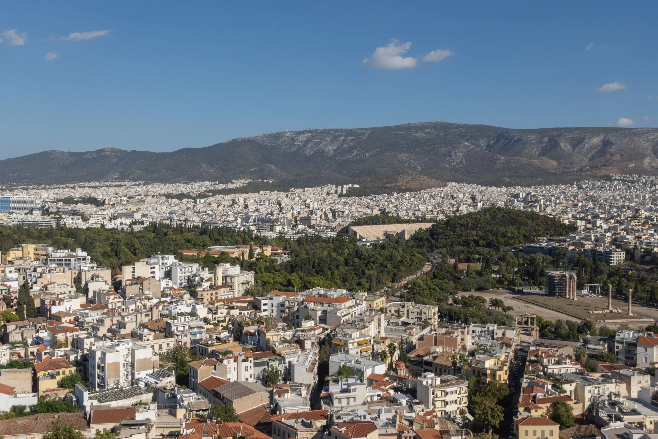 The city of Athens from atop the Acropolis, dotted with buildings