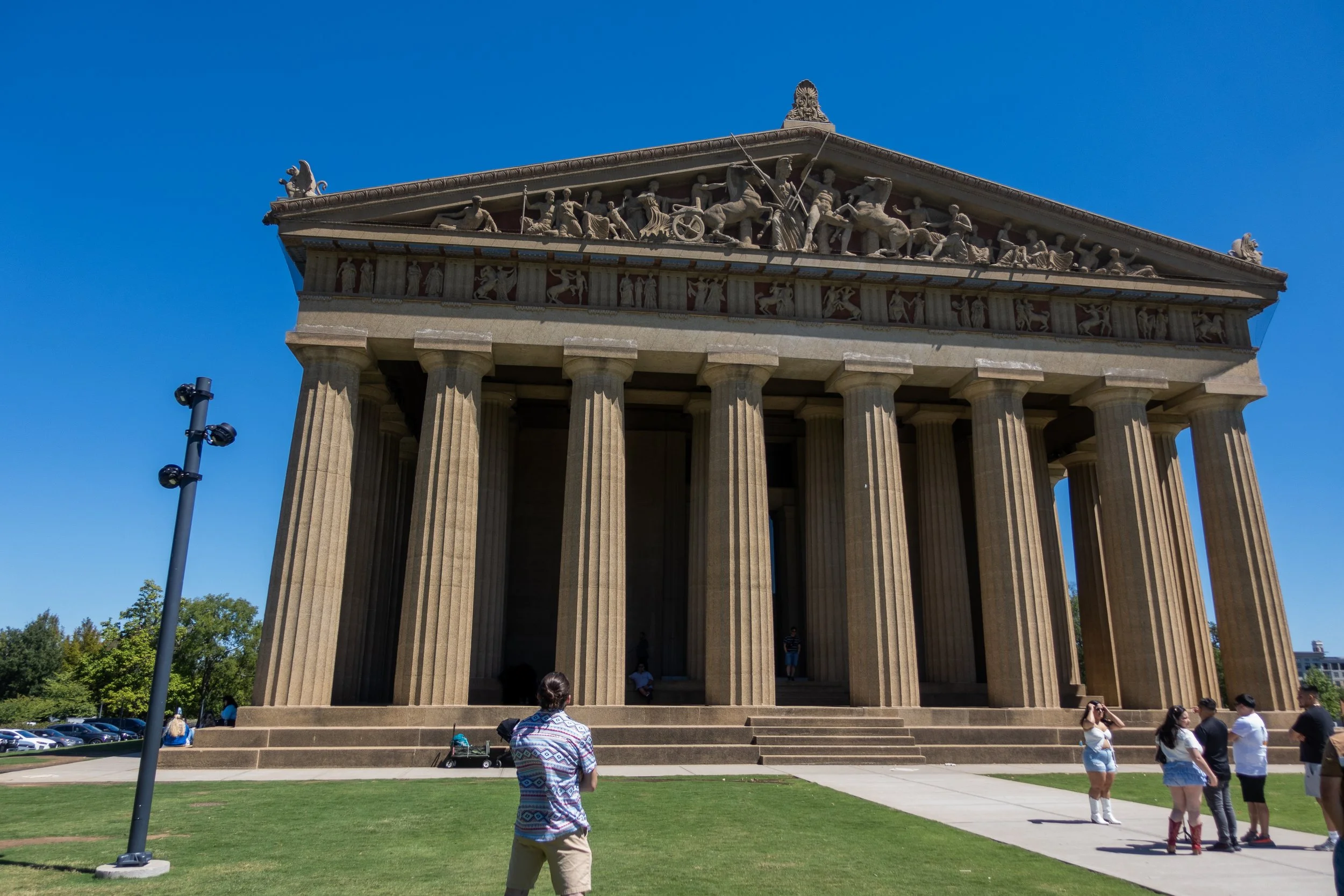 Paul stands in front of the Parthenon in Nashville