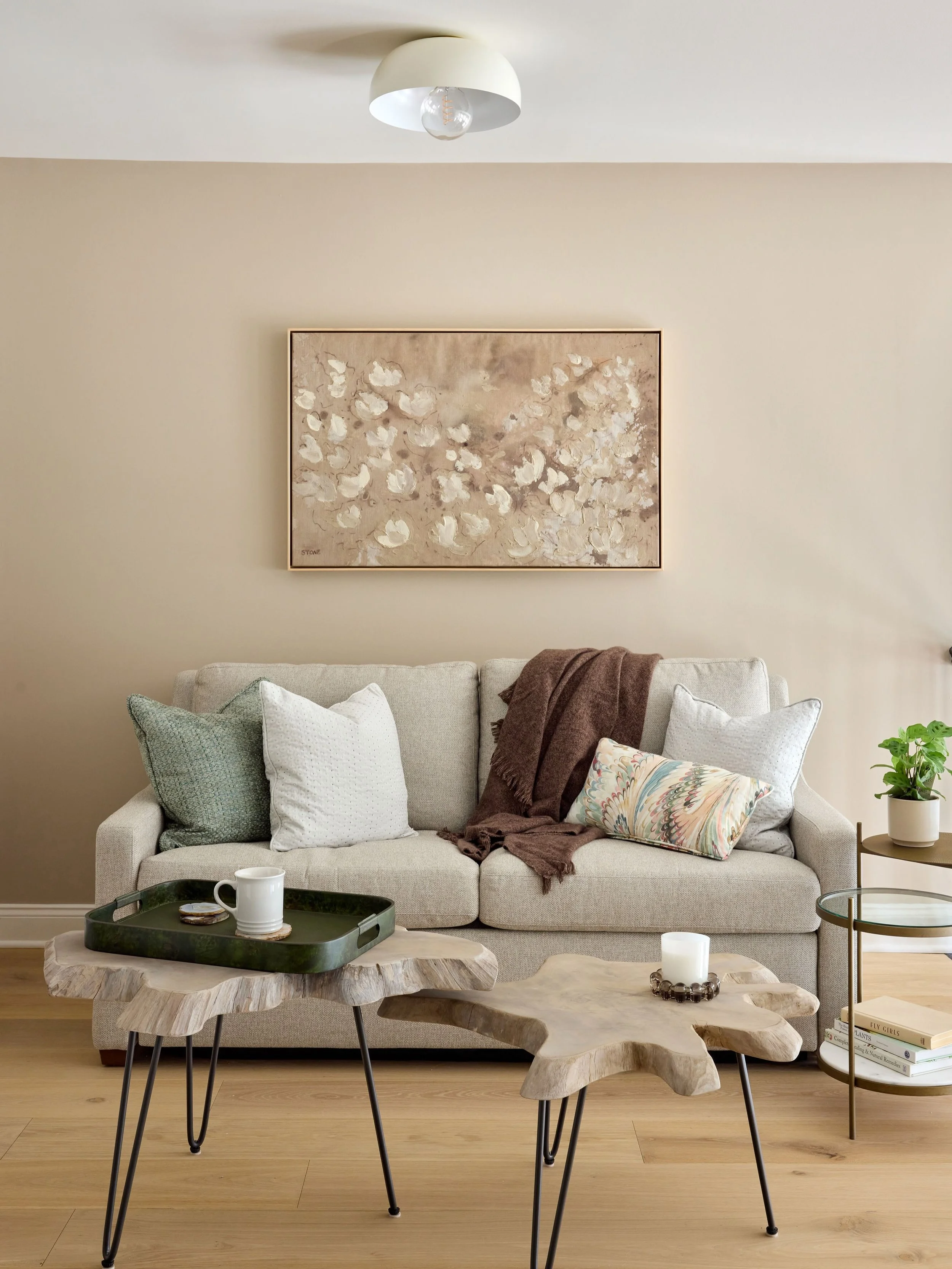 We converted the loft that was once overlooked in to the perfect place for morning coffee or afternoon relaxation when you just need a quiet space. 
There was plenty of storage else where so we could convert this closet (to the left of the sofa) in t