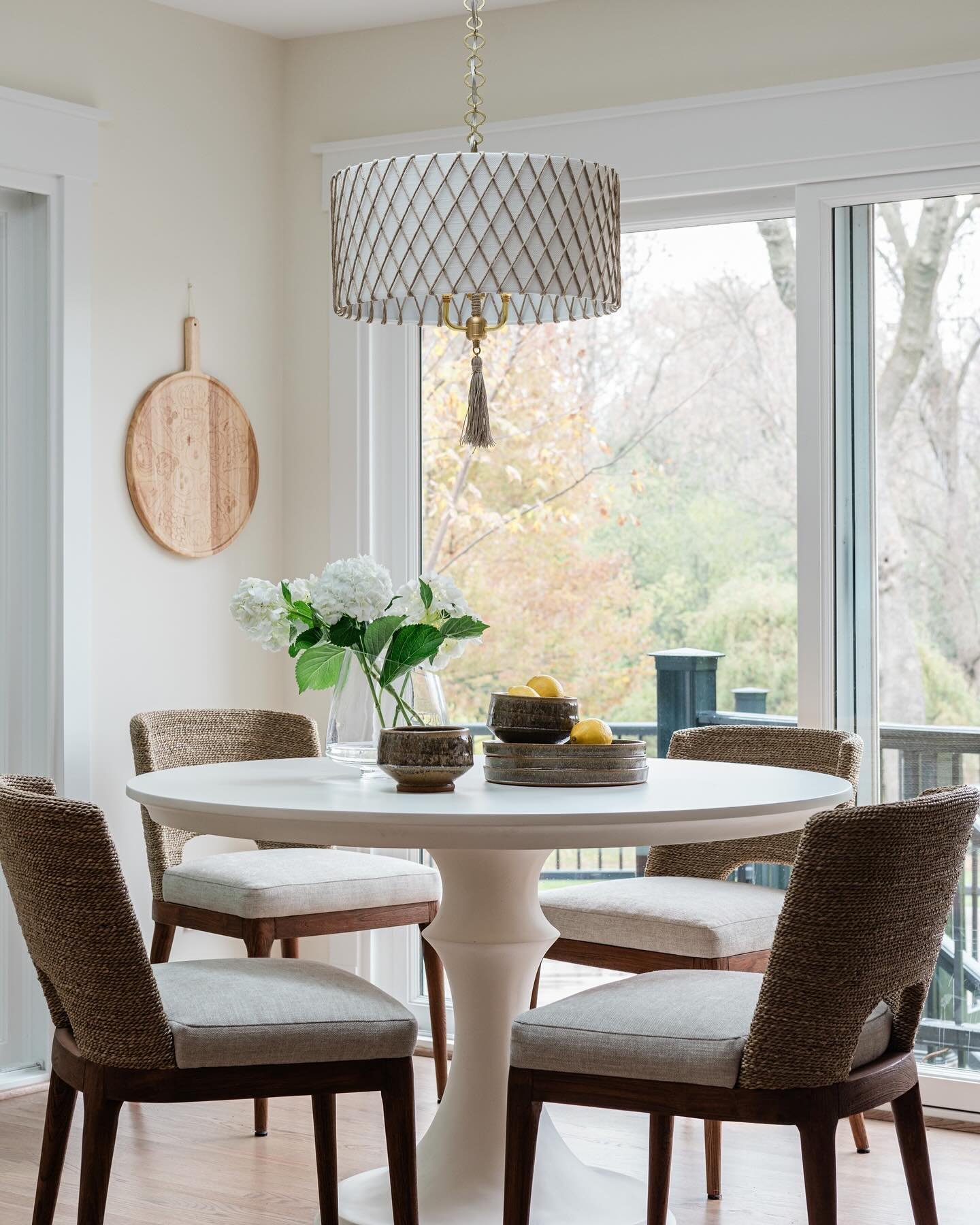 Morning light, woven details and artisan touches bring the breakfast nook at our #kedbuckysway project to life. 

Our clients fell in love with their home for two reasons. First, the amount of natural light, and second for its lovely woodland locatio