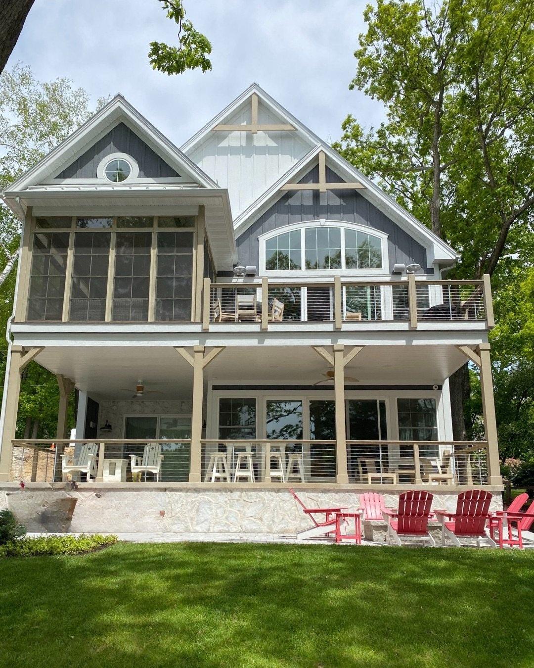Lake days begin here.

For this vacation home, the design focused on creating flow between indoor comfort and outdoor living. The home naturally settles into the surrounding trees while keeping the lakefront view front and center.

Every level was de