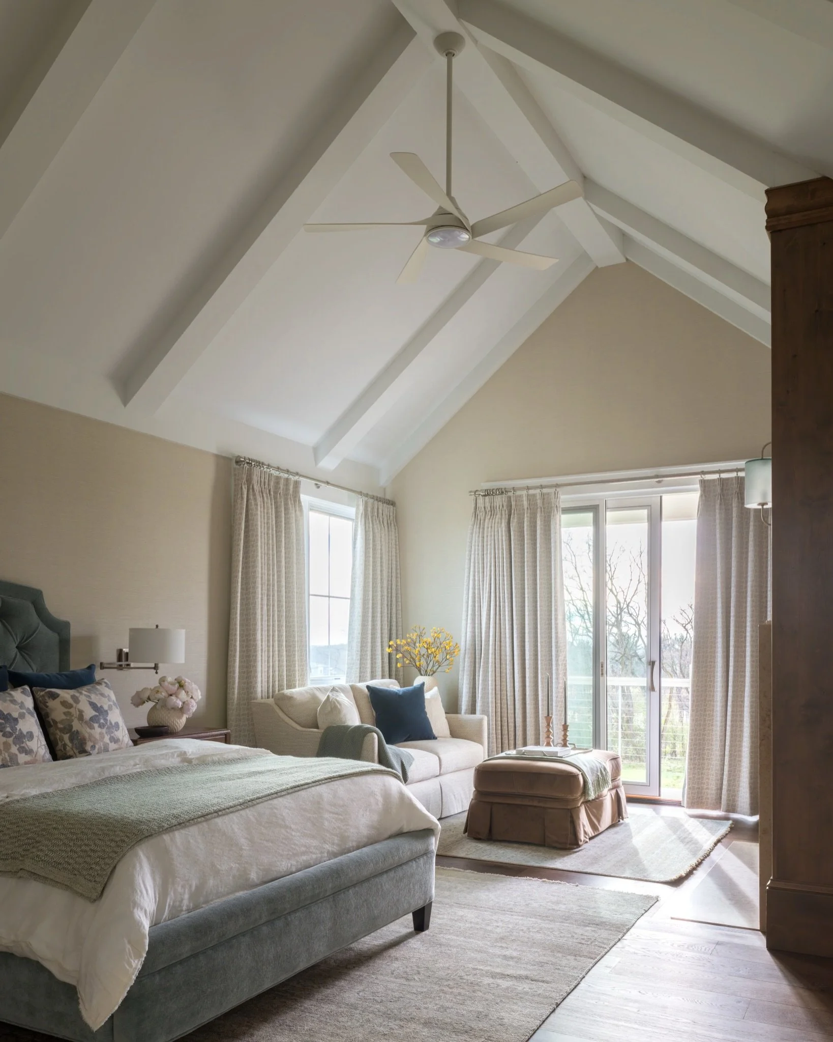 This primary suite started with a feeling, not a floor plan.

The clients wanted to walk into their bedroom and feel like everything else could wait. Avid readers, they wanted a spot to settle in with a book, somewhere that felt cozy and quiet but st