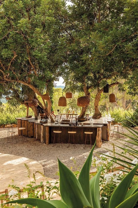 Communal dining area under tree.jpeg