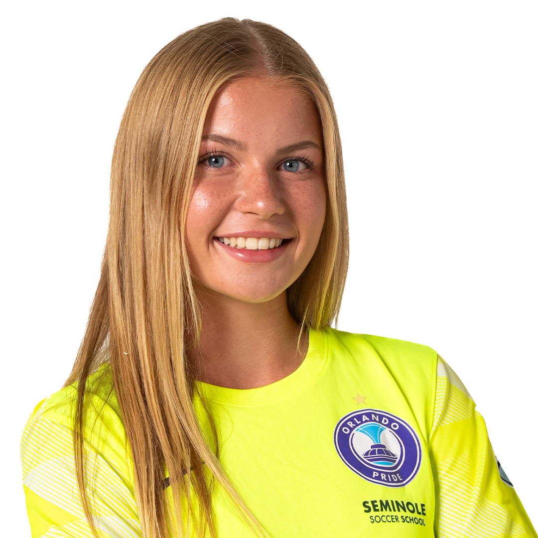 Young woman with long blonde hair wearing a neon yellow soccer jersey with 'Orlando Pride' and 'Seminole Soccer School' logos, smiling at the camera.