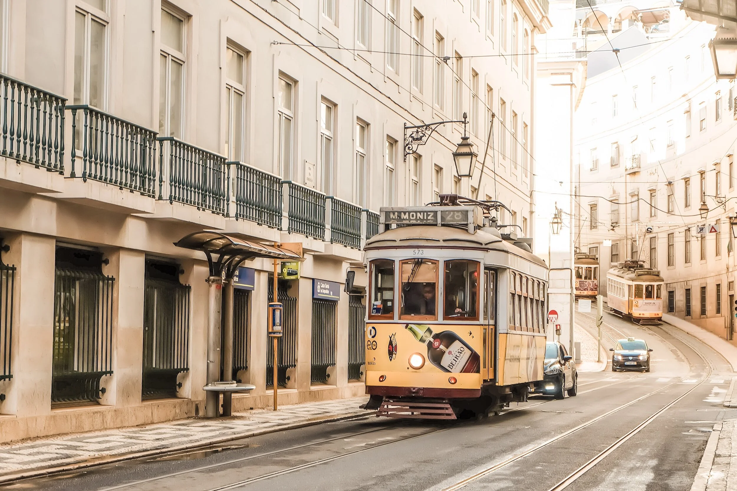 rail car in the city passing down the street