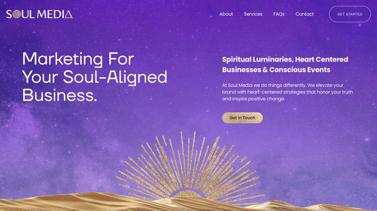 Website homepage for Soul Media with a cosmic purple background, gold desert scene at the bottom, and a sunburst design. The page features text about marketing for soulful, heart-centered businesses and events, with navigation links and a "Get Starte