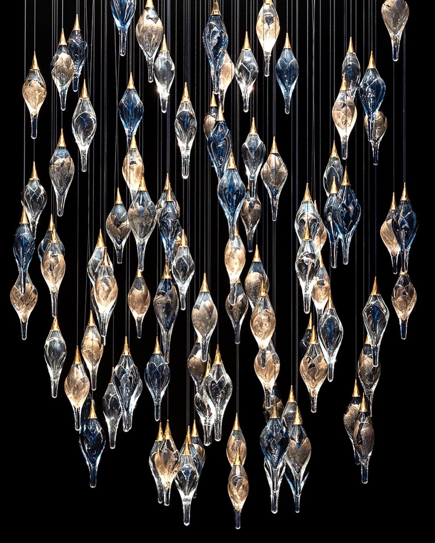 Capturing the beauty of imperfection through custom blown glass and metal lighting. Ilex by  Studio Bel Vetro.