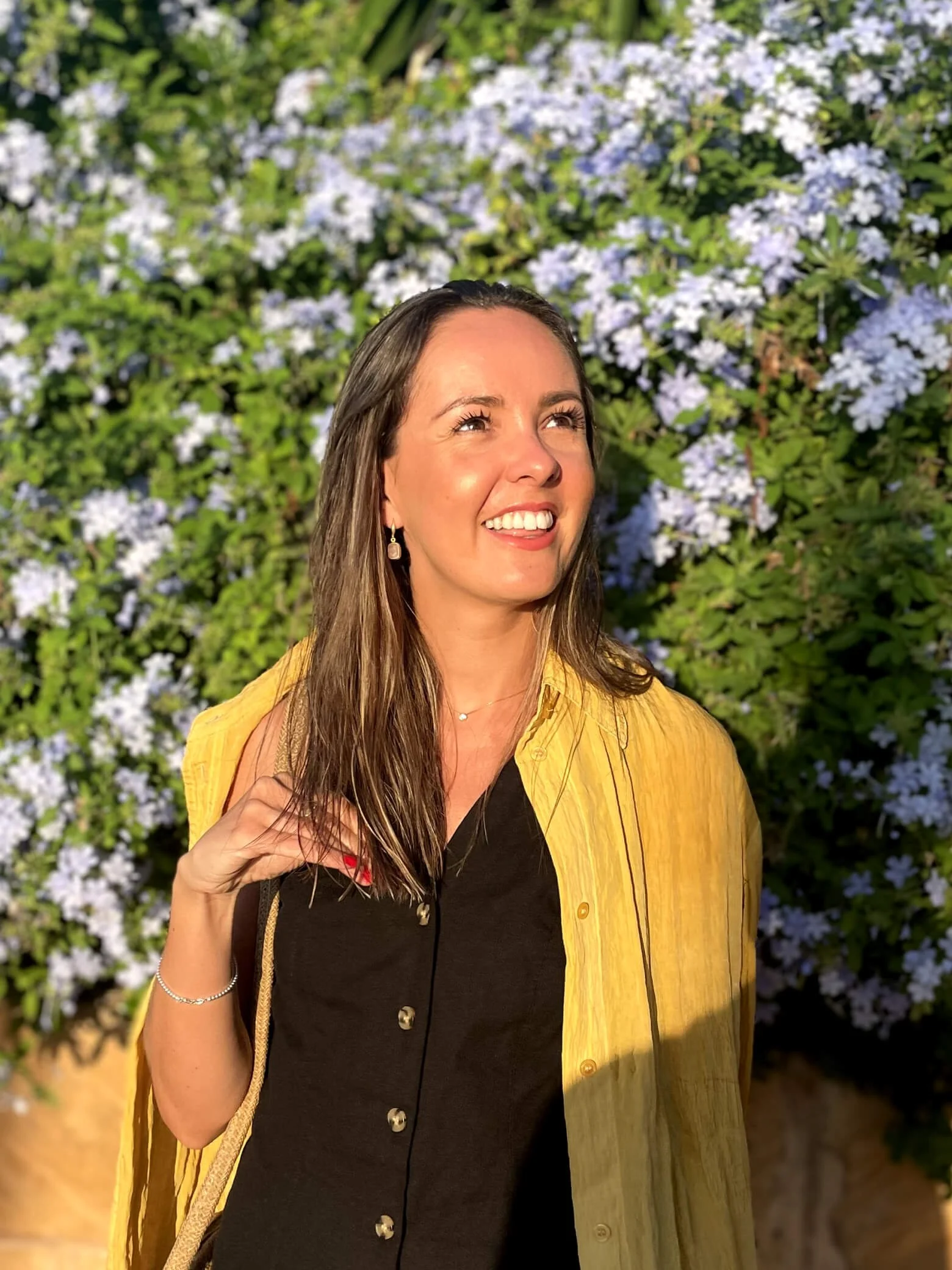 Sarah smiling in the sun