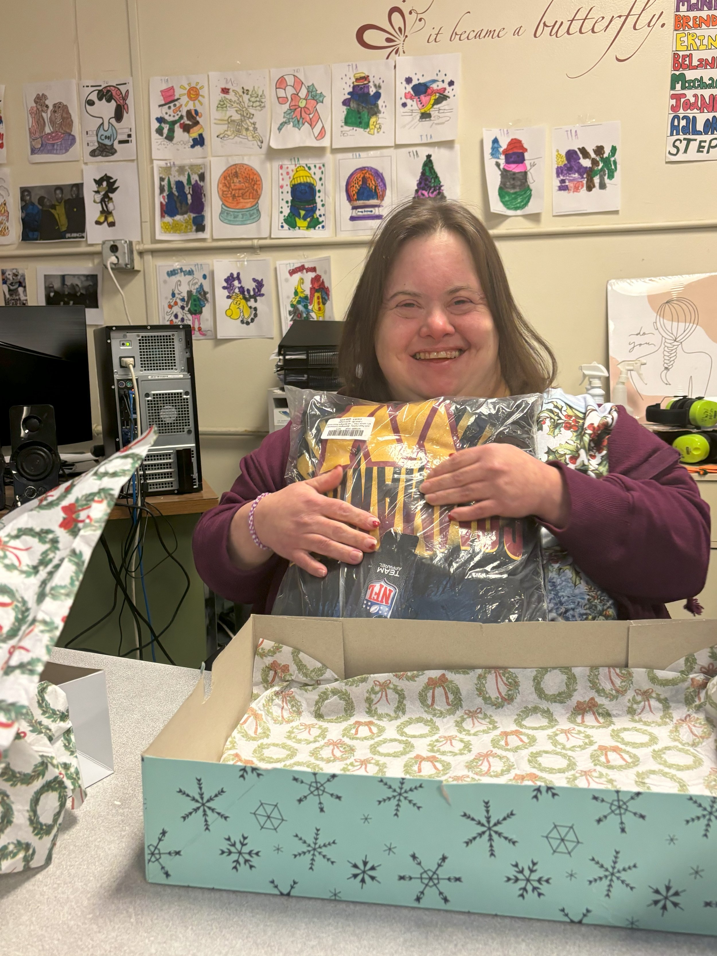 NW Works service recipient Erin with her Holiday Party gift