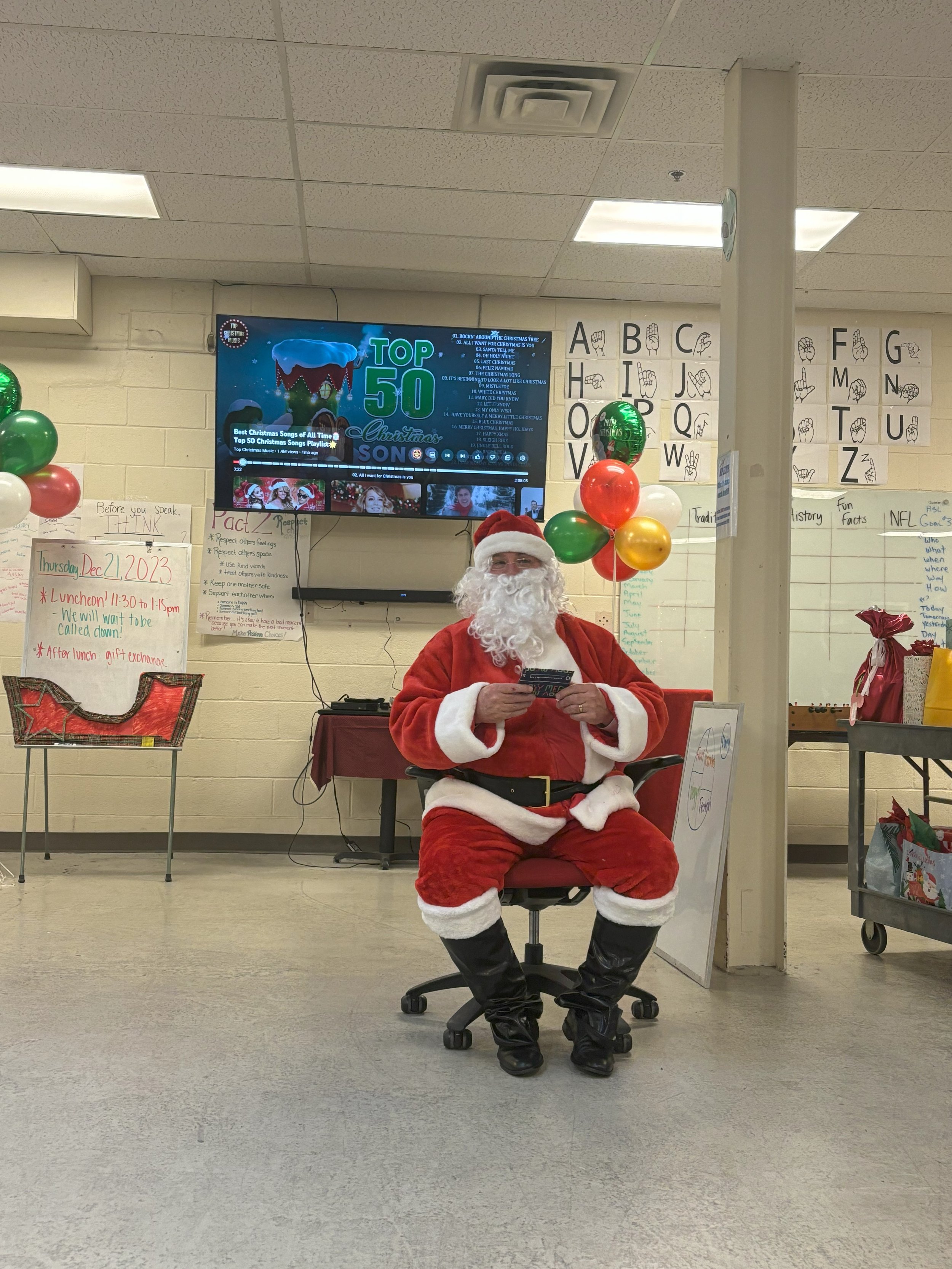 NW Works' Santa Clause prepares to give out presents at the 2023 Client Holiday Party
