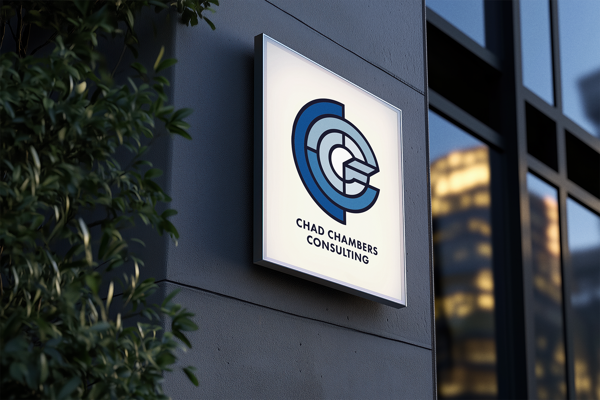 Exterior signage mockup for Chad Chambers Consulting, featuring the modernist monogram logo in a monochromatic blue palette.