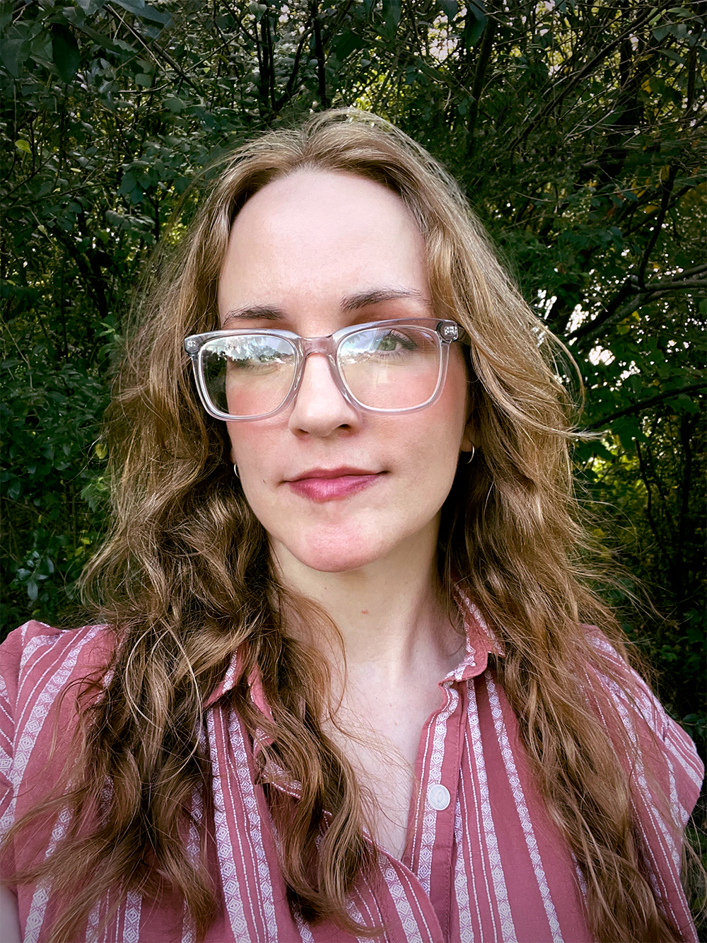 Headshot of Rachael Ann Lester, logo designer and brand identity strategist.