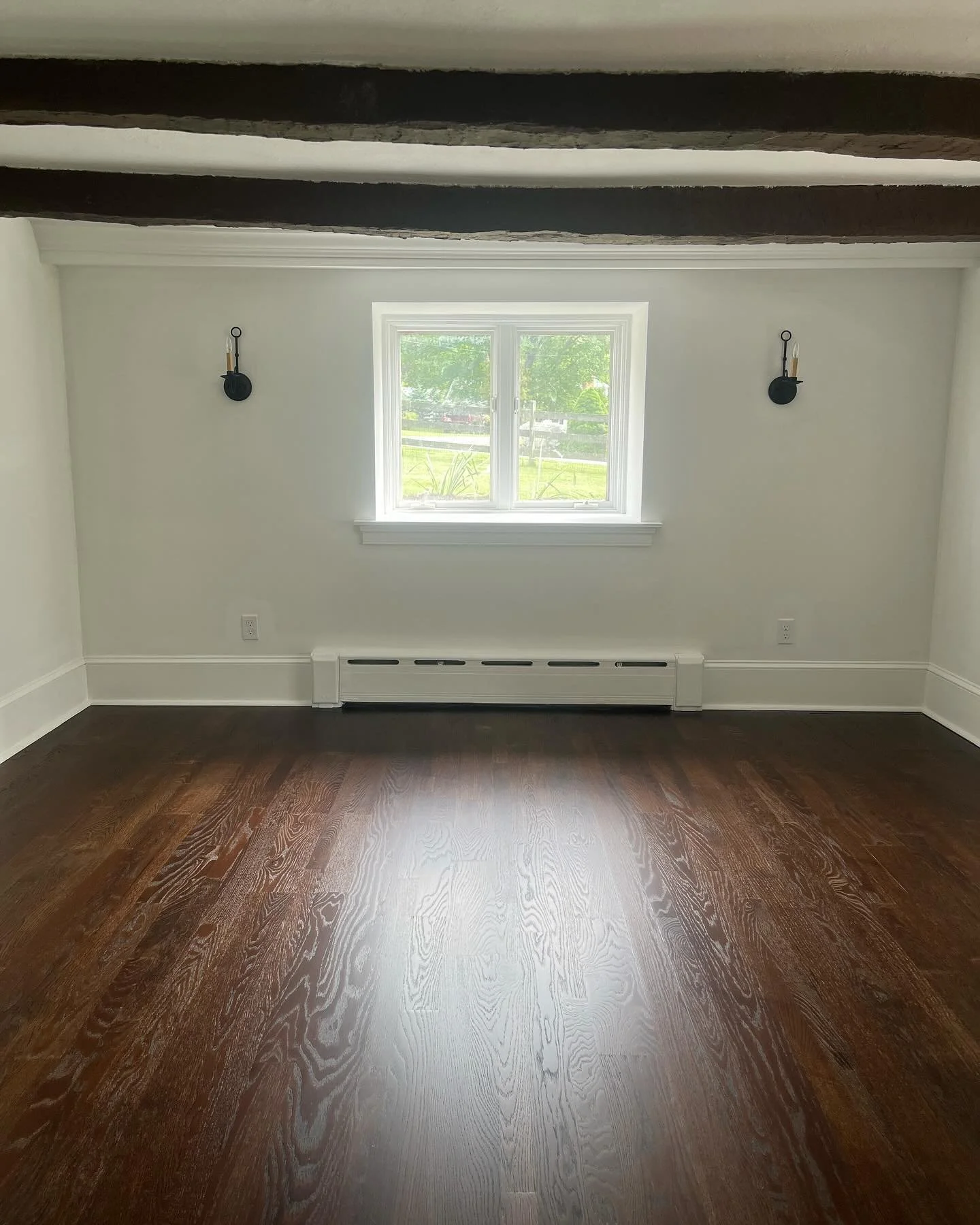 Complete gut. New floors, walls and trim packages for this historic farmhouse dinning room!