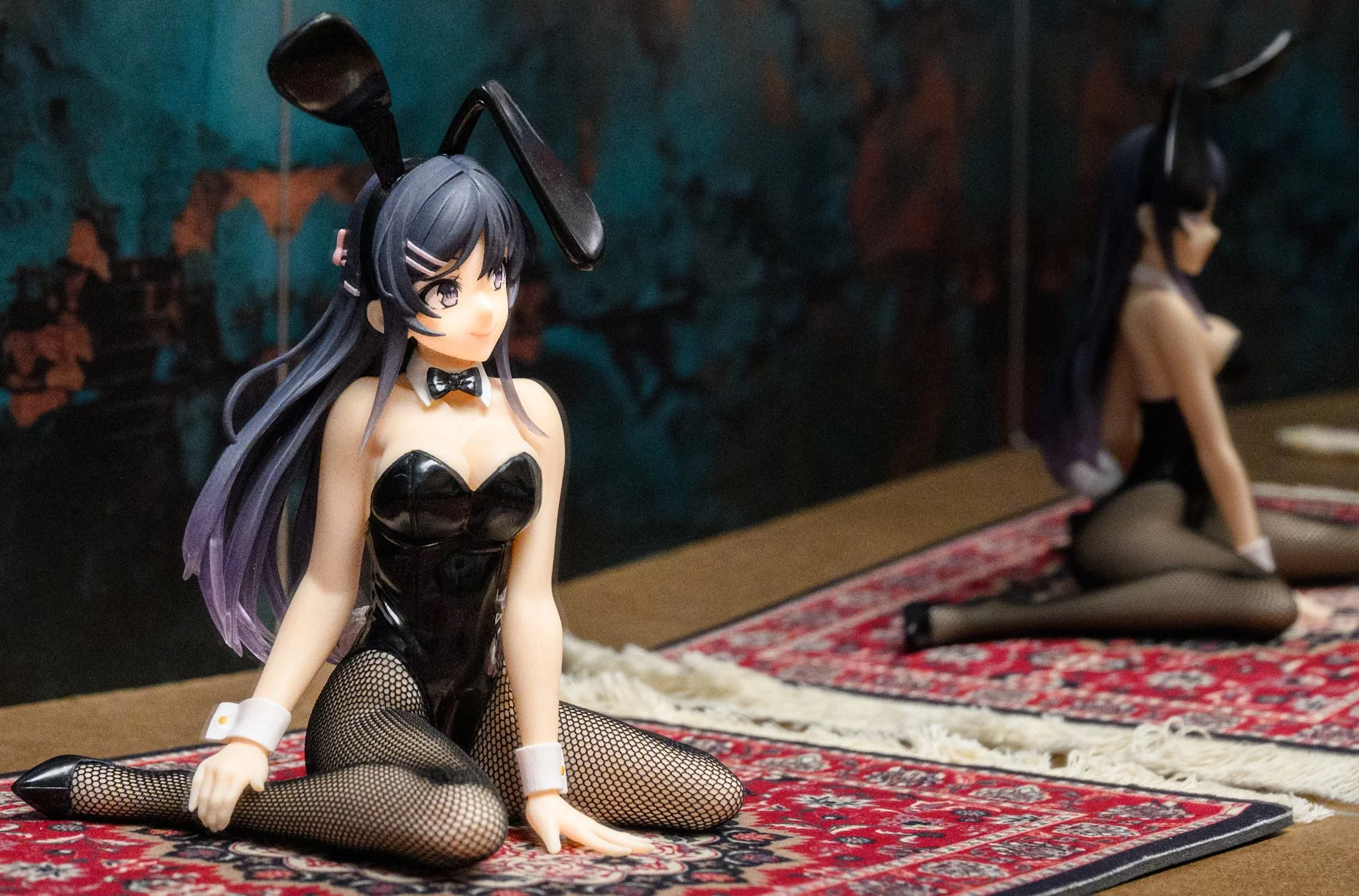 “Anime-style bunny girl figure seated on a patterned rug in a stylized interior, with a mirror behind her showing a softer reflection of the same figure, creating depth and a layered composition.”