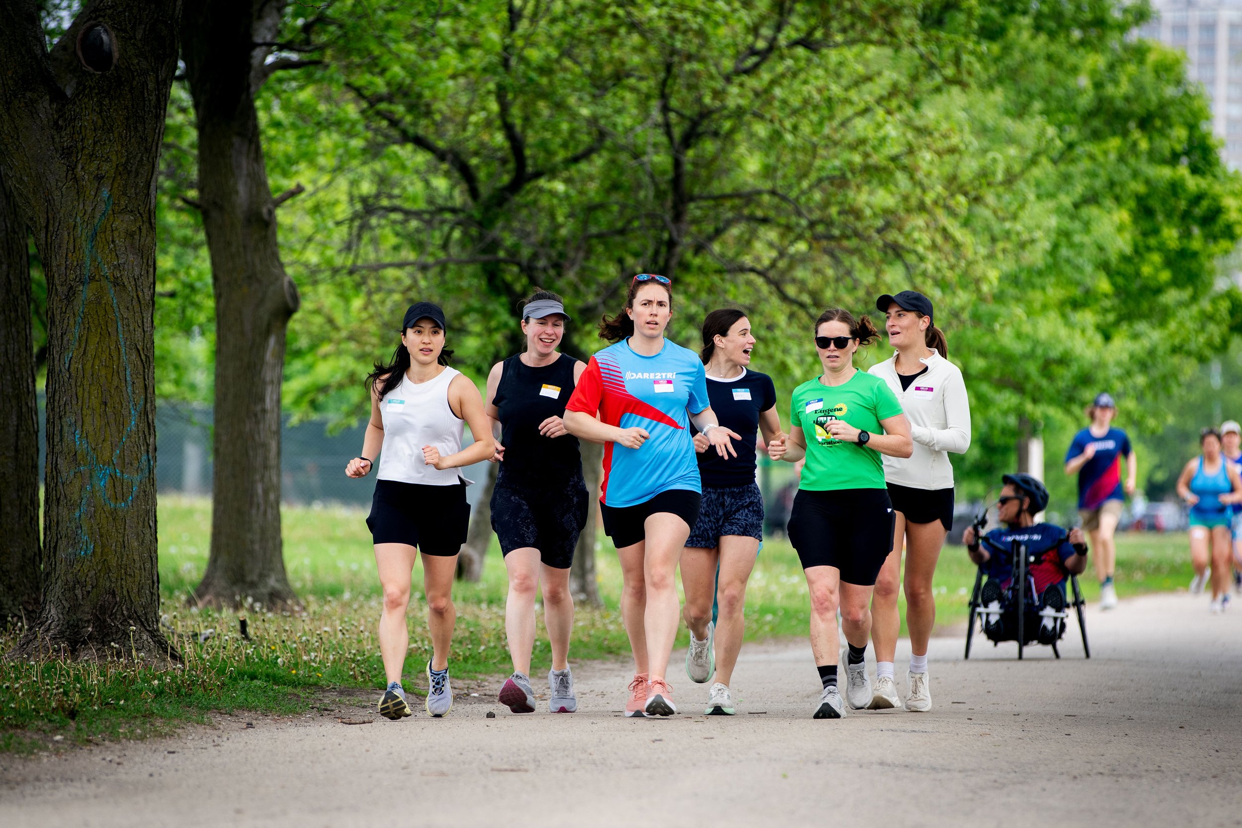 Participants running and biking during the Dare2tri Storytelling 5K