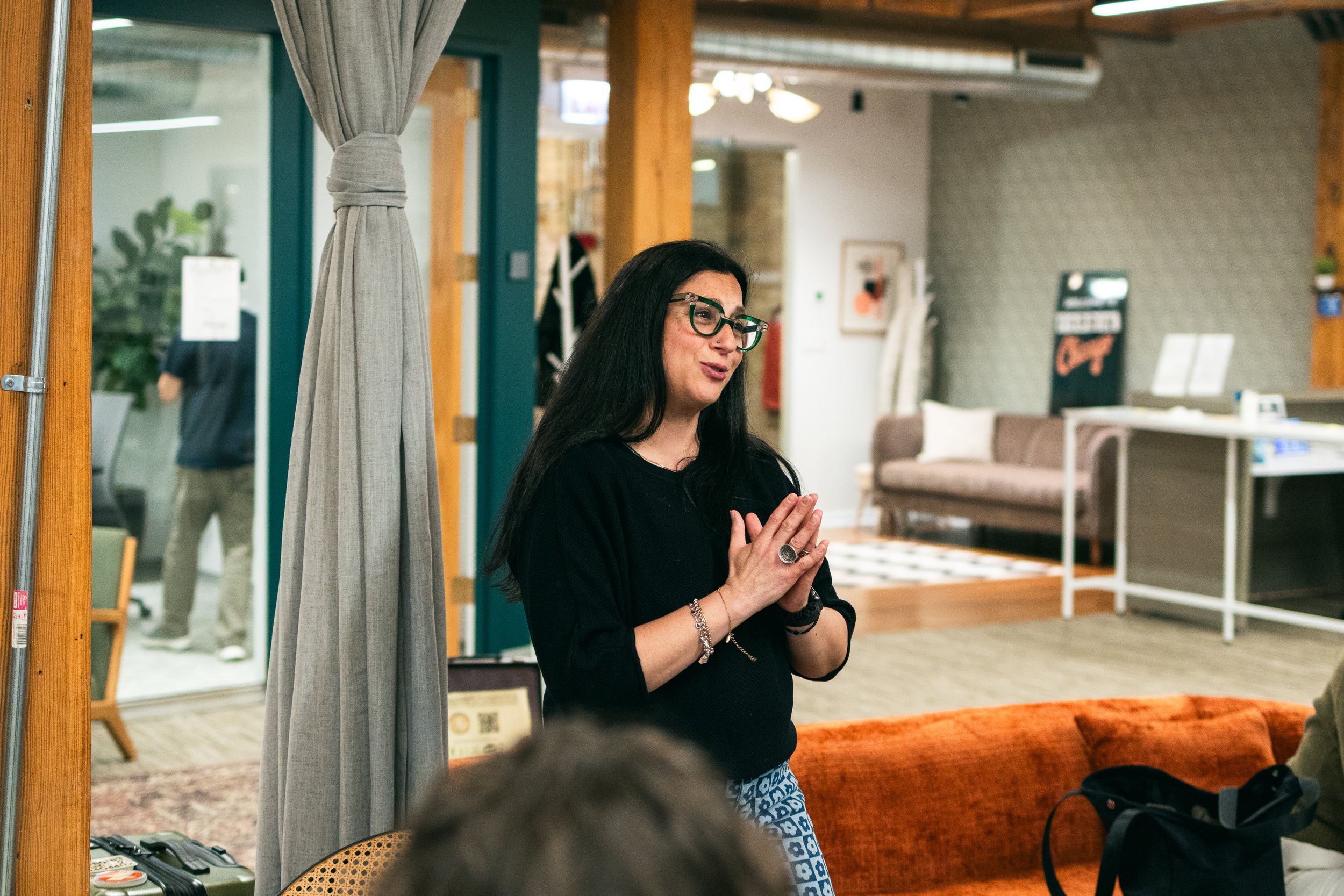 Megy Karydes speaking at the event