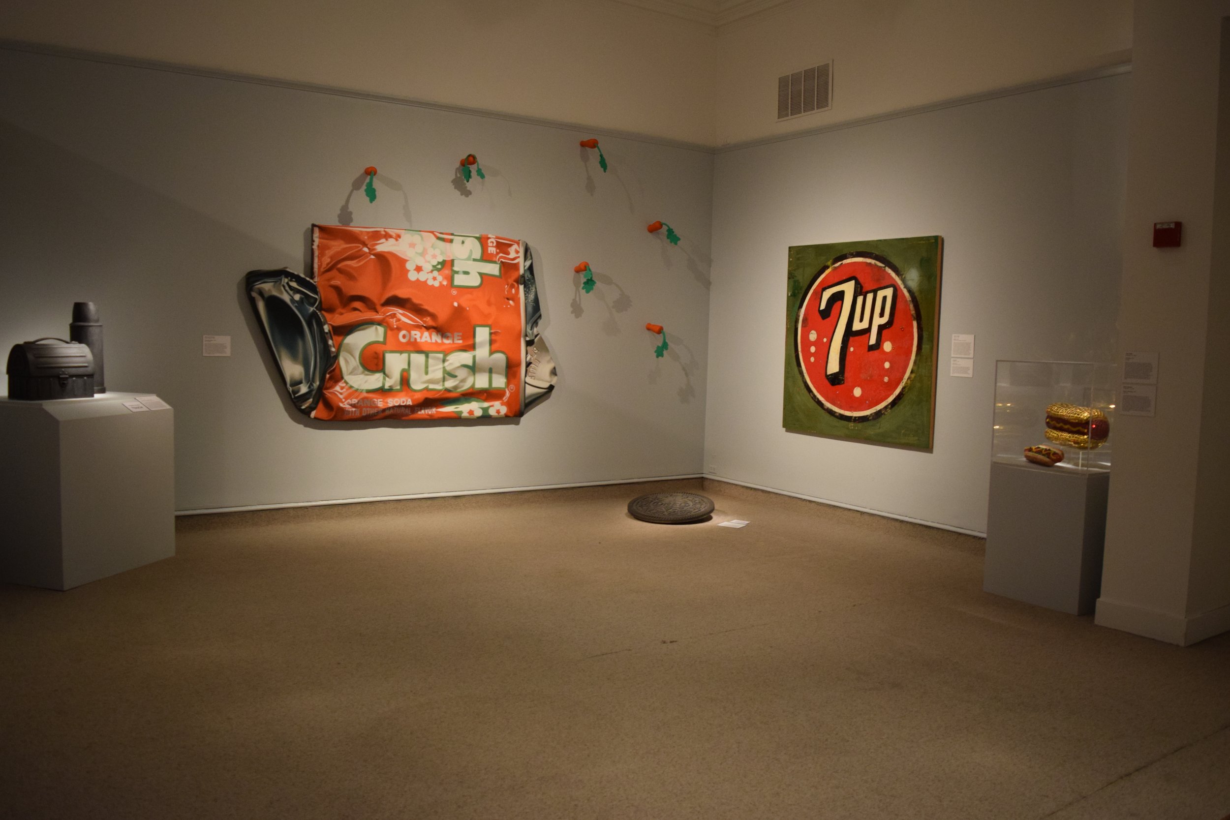  Daniel Oates,  Lunch Box and Thermos  (1992); José Luis Quiñones,  Crushed Orange  (1980); Vincent James,  Bullets  (2000); Andrew Lewicki,  Oreo Manhole Cover  (2010); Greg Miller,  7UP  (2005); Betty Spindler,  Pink’s Hot Dog  (2007); Jean Wells, 