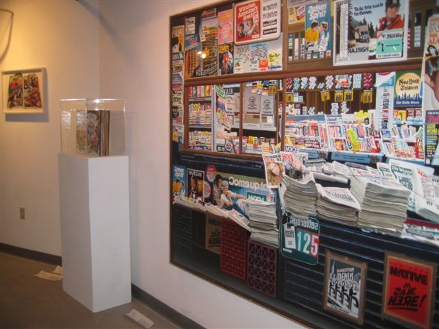  Kim Rugg,  Bullets Ain’t Stoppin’ Him  (2007); Masaaki Sato,  Newsstand No. 8  (1984) 