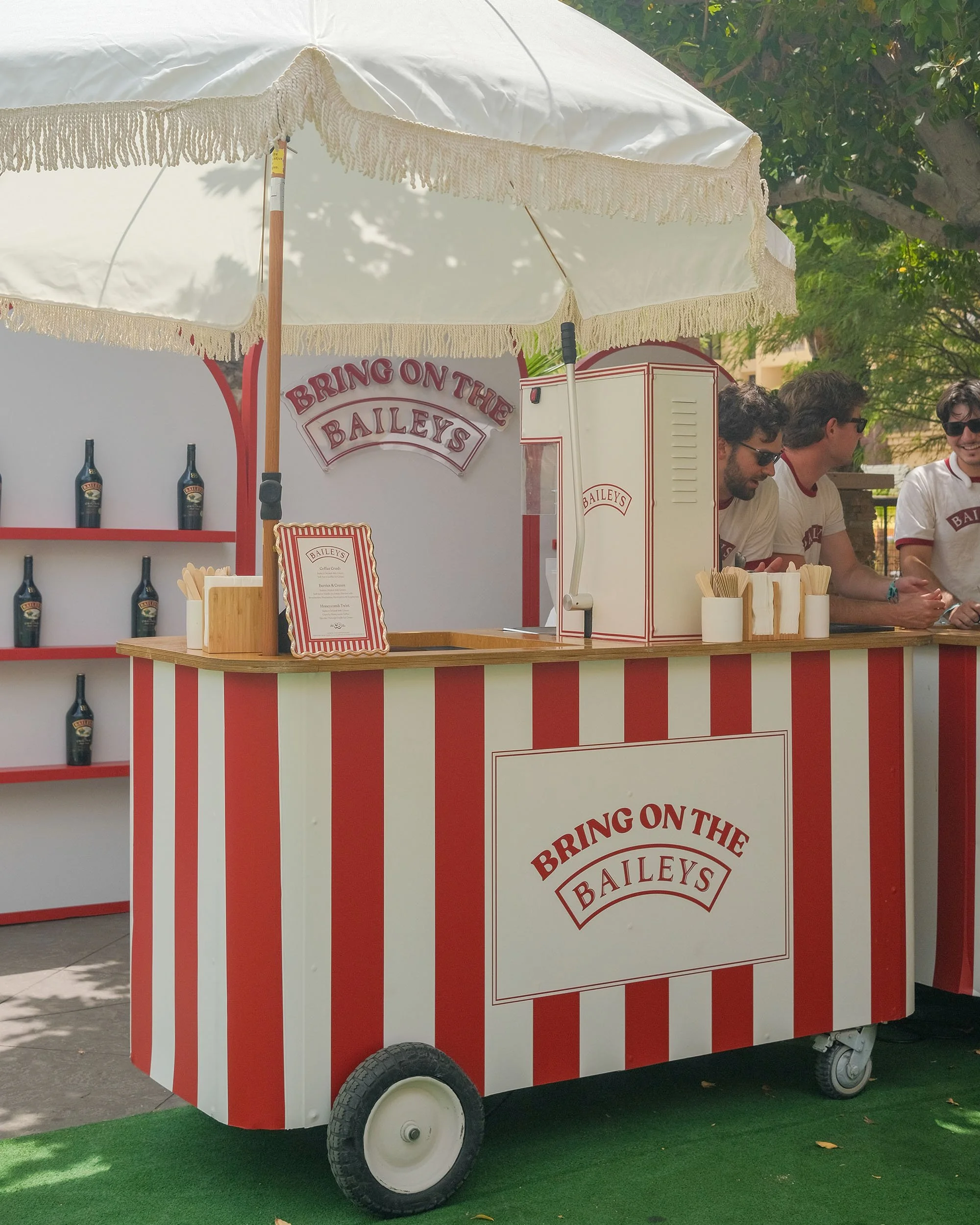 Baileys brand activation cart set up with custom branded vinyl and machine wraps