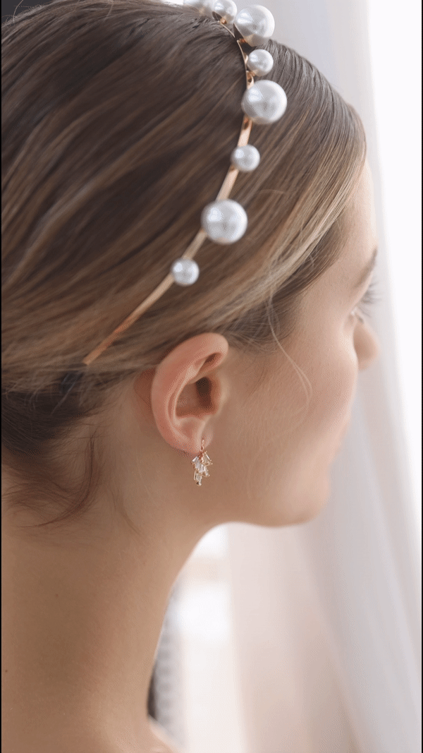 Modern bridal earrings and Jewelry for Minimal Classic Brides. Model wearing Bowie Earrings Studs with rhinestone details