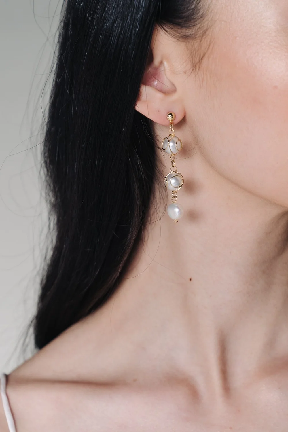Vintage-inspired pearl earrings with gold details | Jade Oi Studio