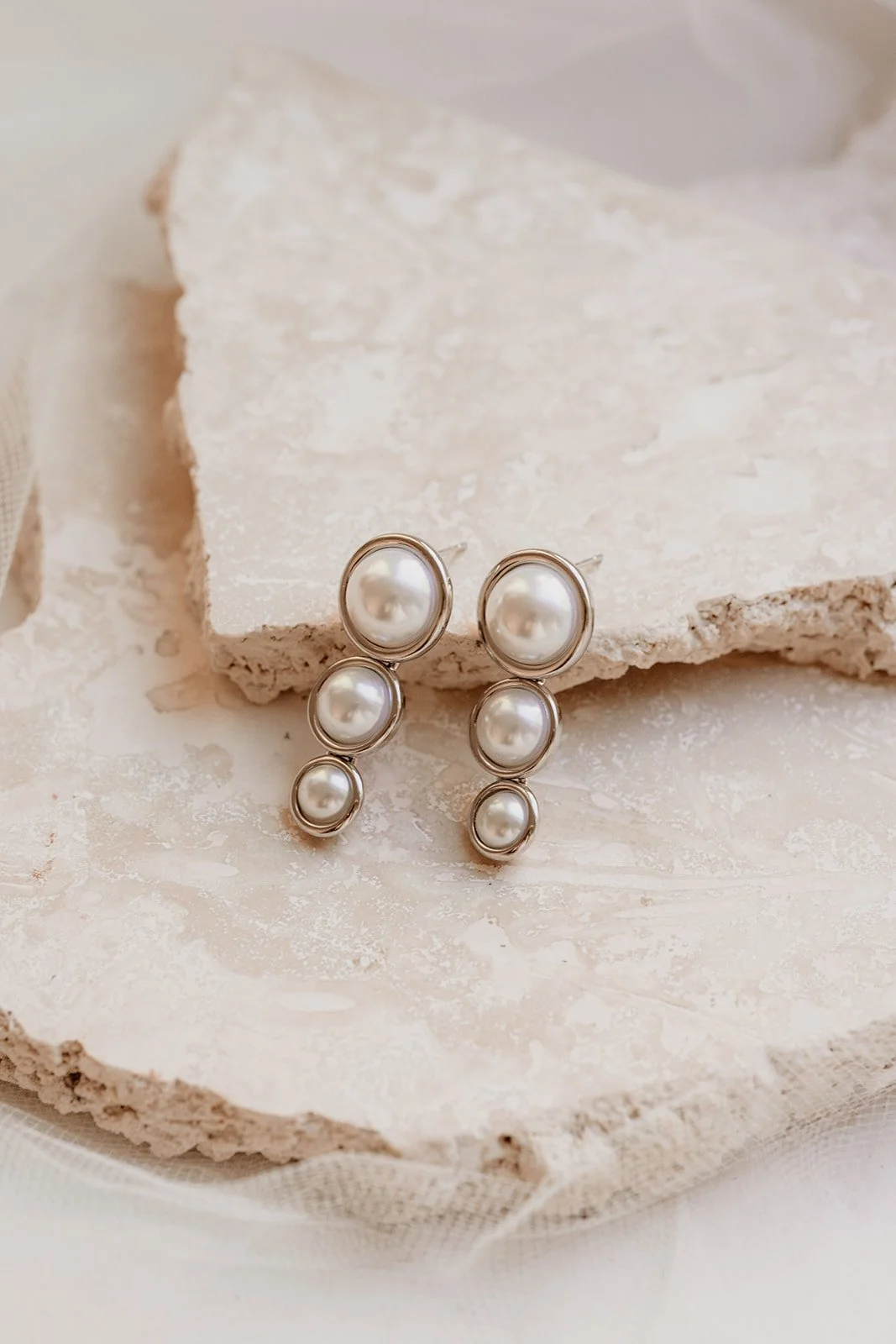 Vintage Inspired Modern Bridal Jewelry. 3 three pearls drop stacked gold wedding earrings.