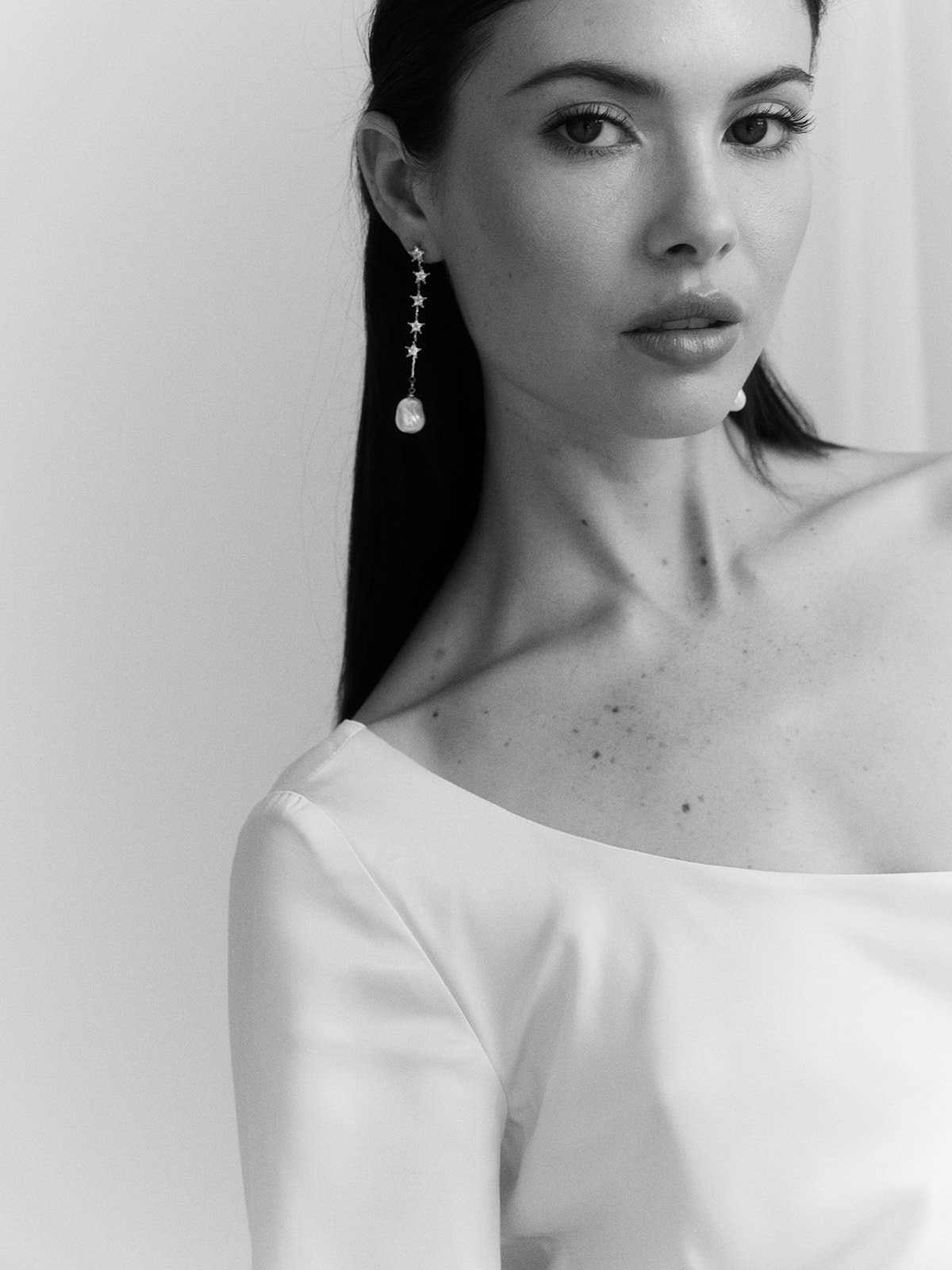 Luxury wedding earrings with baroque pearls and rhinestones, perfect for the modern bride. Lara bridal jewelry from Jade Oi Studio, a quiet luxury jewelry brand.