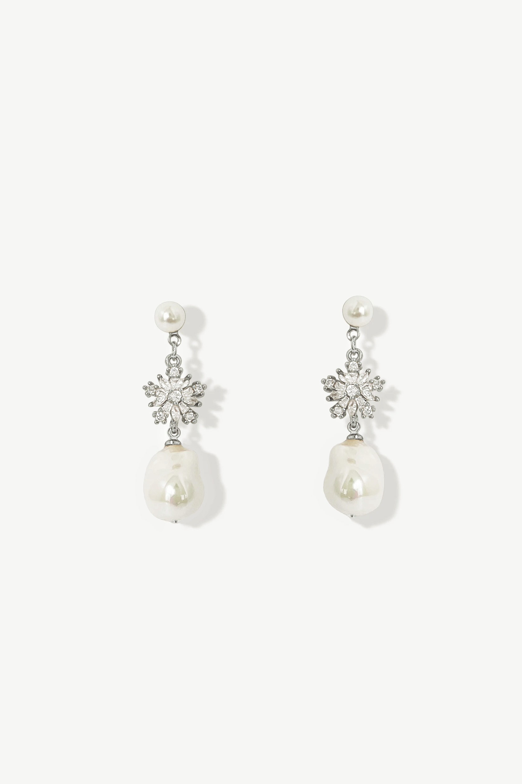 Luxury wedding earrings with baroque pearls and rhinestones, perfect for the modern bride. Ames bridal jewelry from Jade Oi Studio, a quiet luxury jewelry brand.