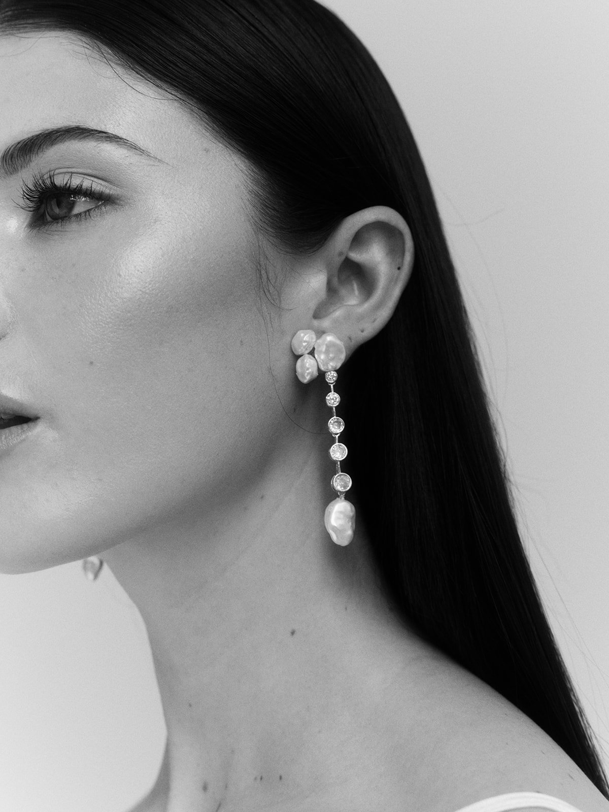 Luxury wedding earrings with baroque pearls and rhinestones, perfect for the modern bride. Sabine bridal jewelry from Jade Oi Studio, a quiet luxury jewelry brand.