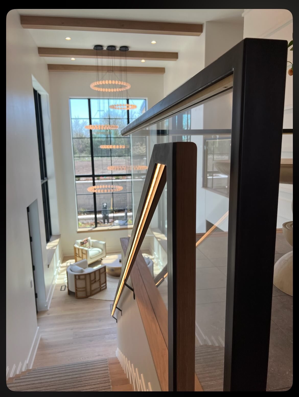 Steel. Brass. Glass. White oak. And a little bit of light. ✨

Day-dreaming of this railing that feels as light and airy as the double height room around it.