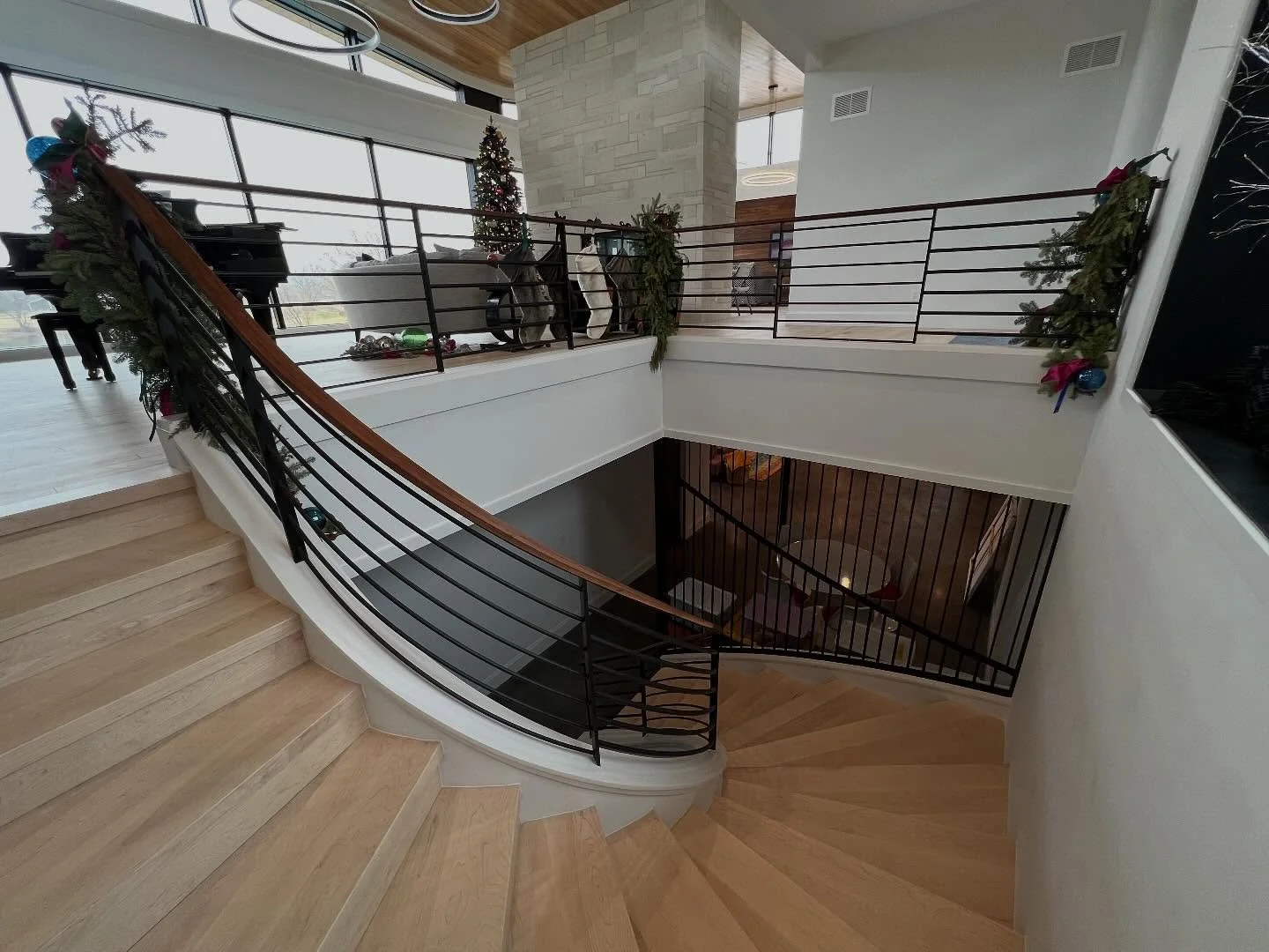 Curve upon curve upon curve. Internal staircase wall built in house to ensure every piece is in precision alignment.