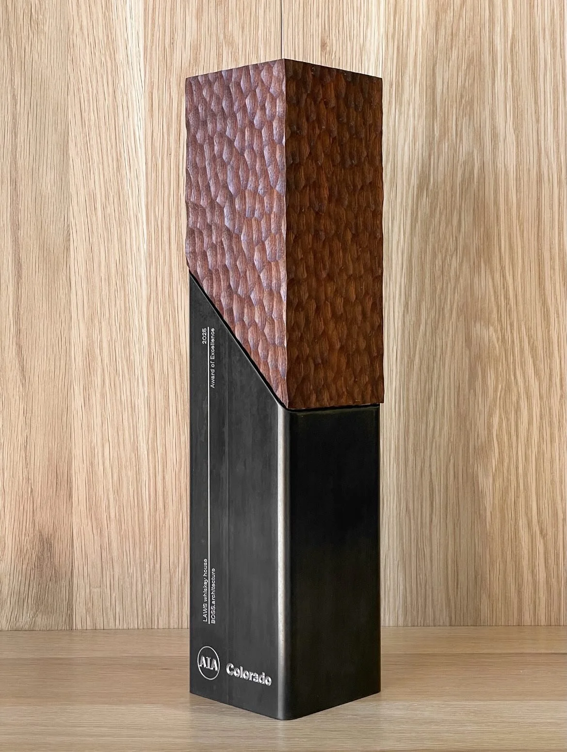 This past year&rsquo;s @aiacolorado award design + build done (you guessed it!) in-house at Ten Works. This award takes architectural cues by using tubular steel and hewn solid walnut. Congrats to @boss.architecture  and all other winners!