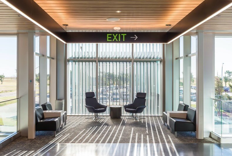 Day or night, outdoor screening impact the look and feel of inside. We still love this anodized aluminum 2-story(+) screening at @gckairport

📸: @essential_images 
@crosslandconstruction