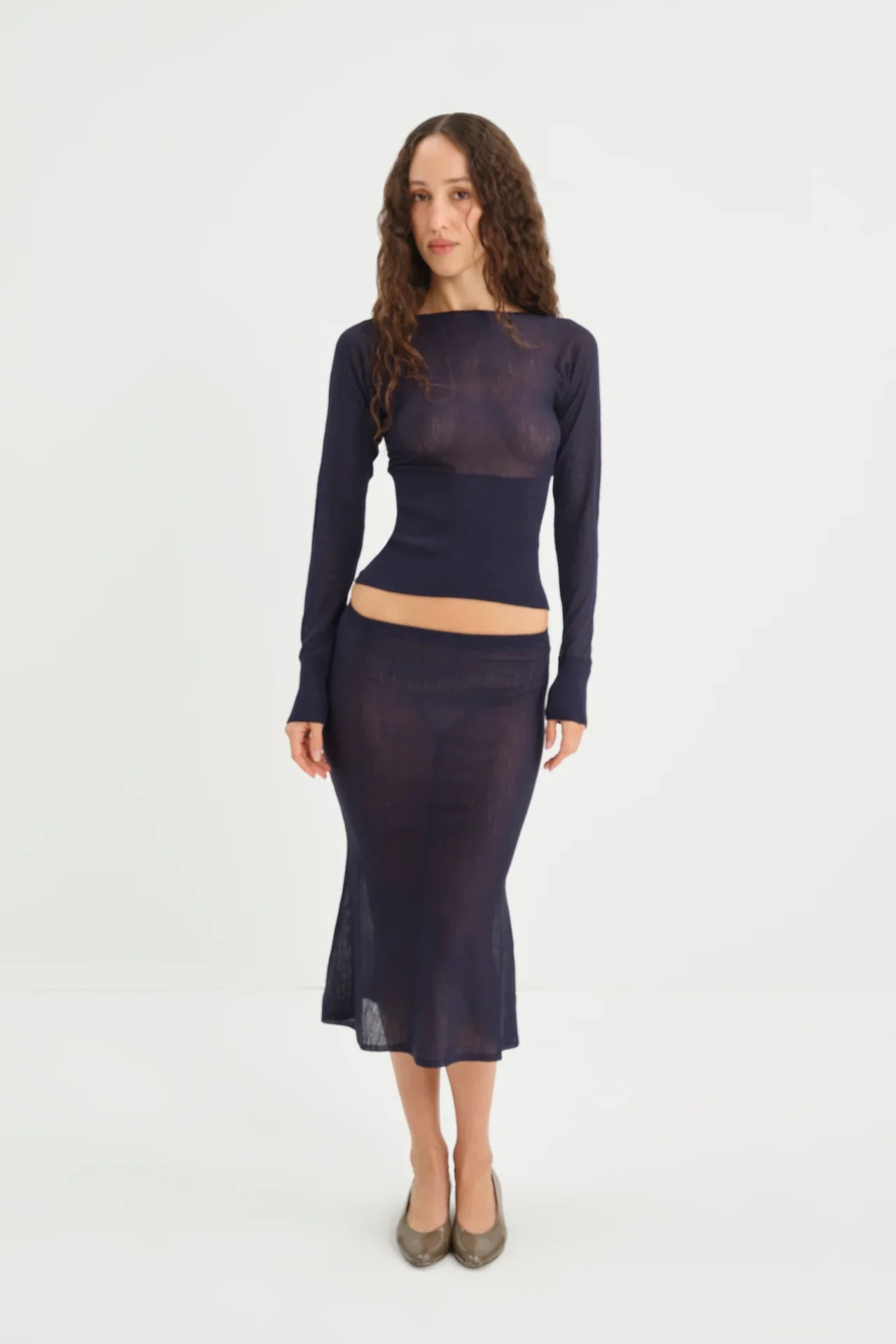 AIMEESKIRT_NAVY_IMAGE-ECOM_MEDIA-STILL_CROP-FULLBODY_ANGLE-FRONT.webp