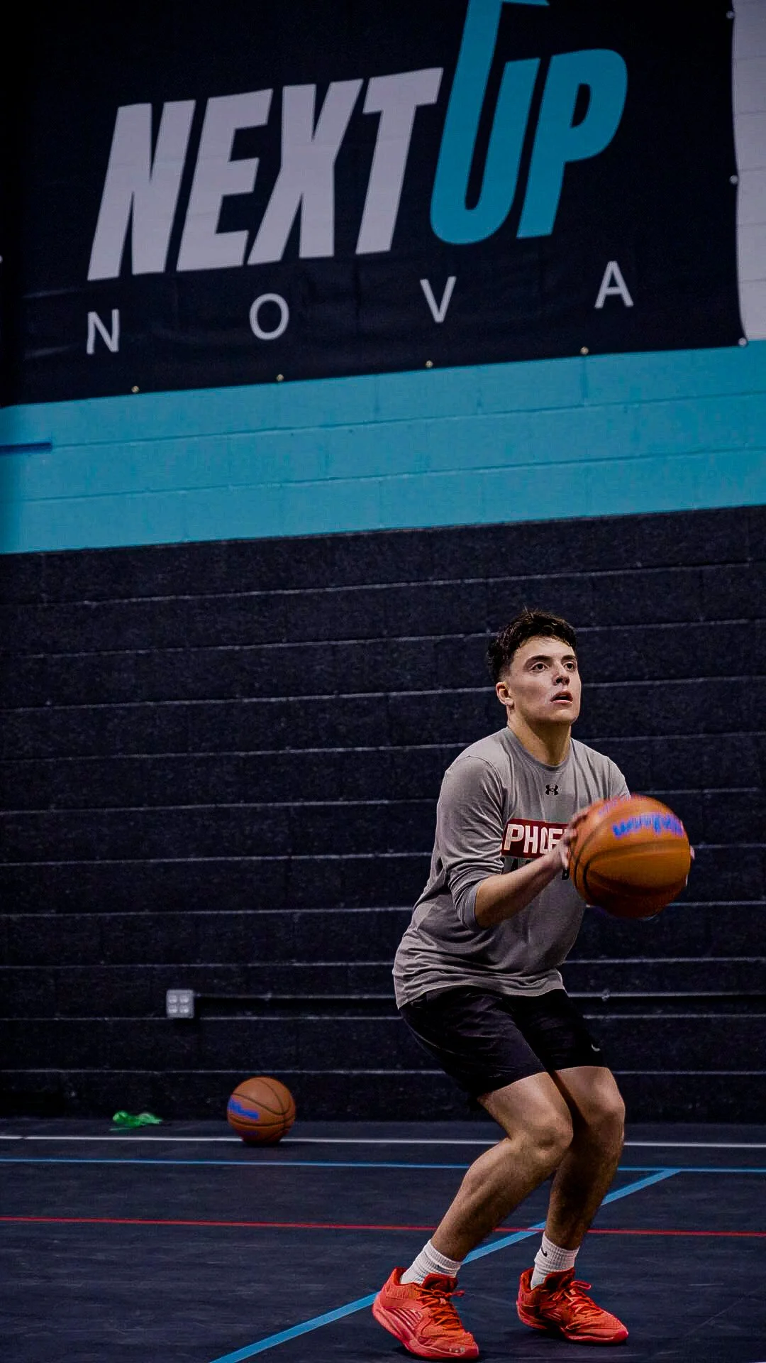 Man preparing to shoot basketball-showcasing next up nova basketball training