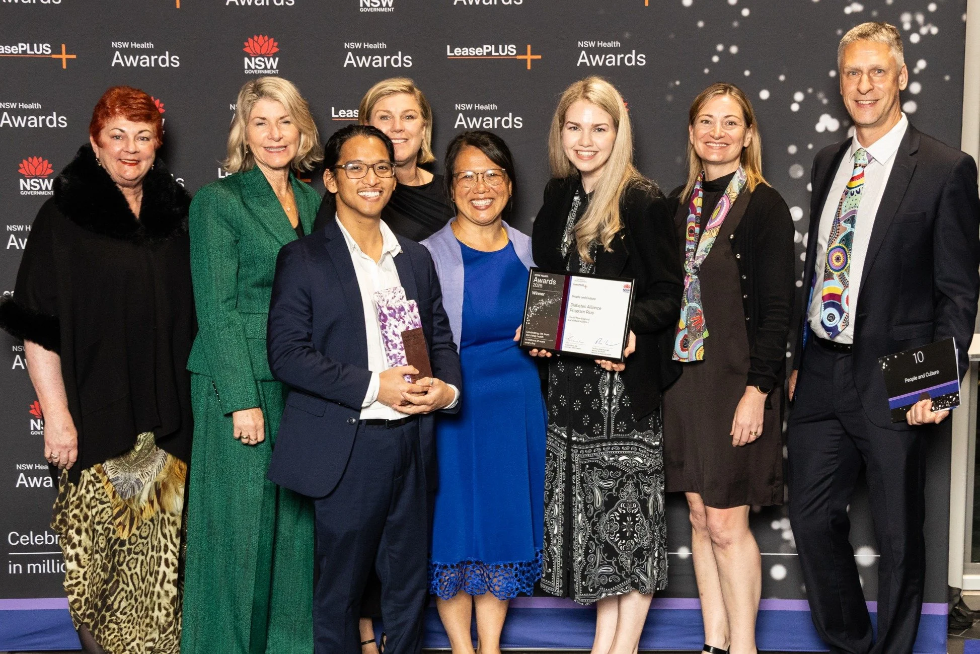 Team photo with Tracey.jpg