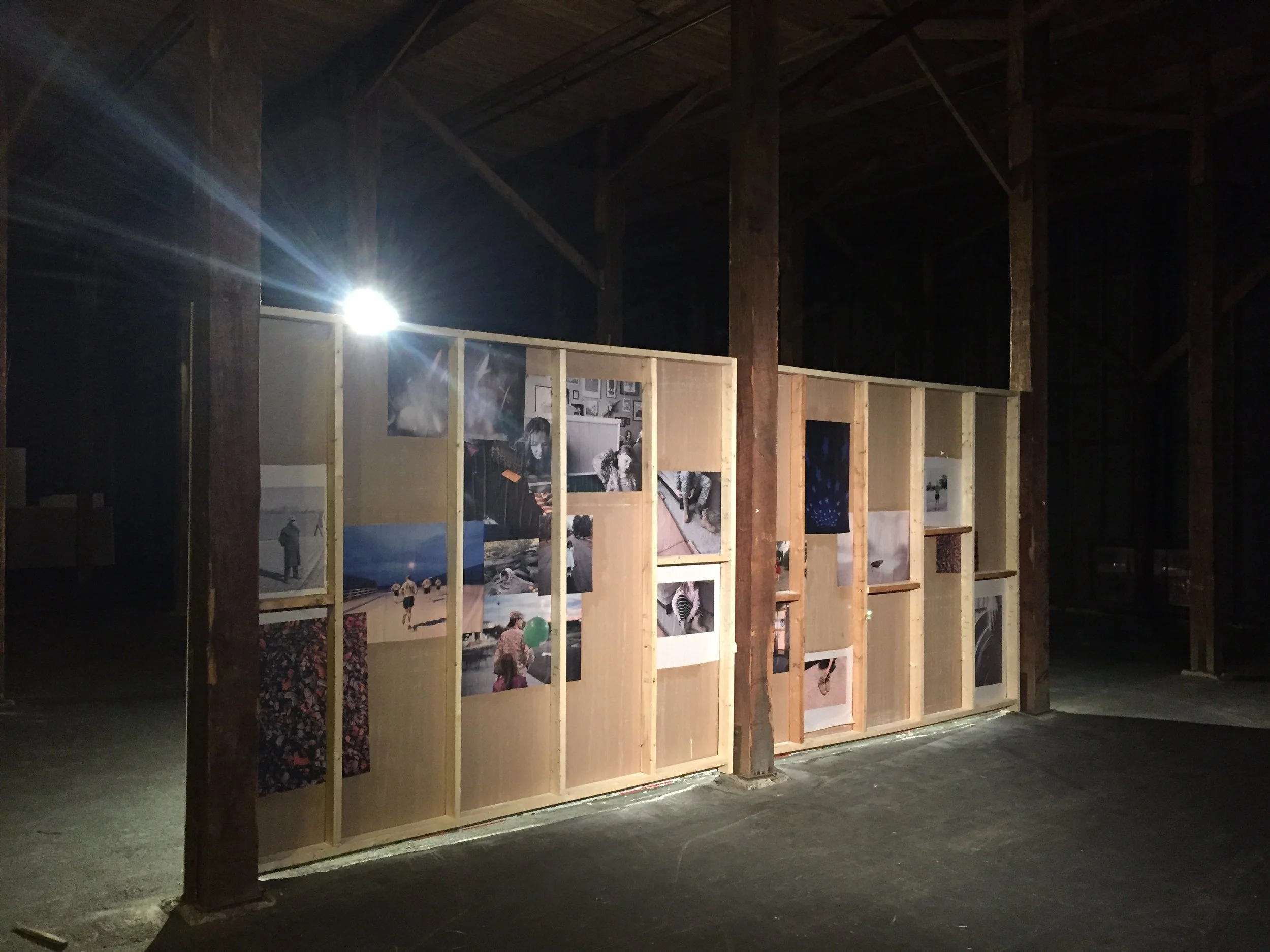 outtakes pasted on the back of the gallery wall.