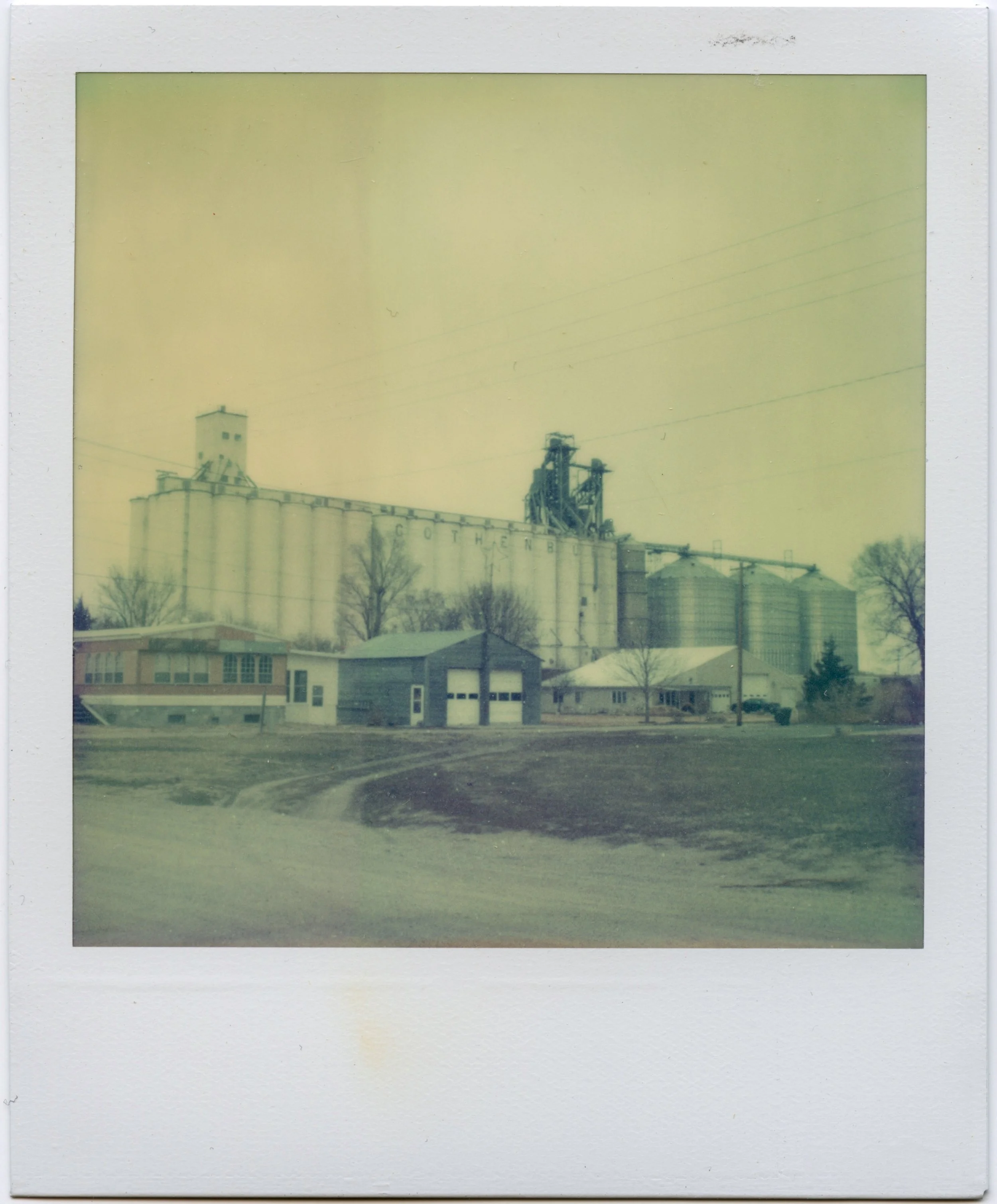 a polaroid of the grain elevator in Gothenburg, Nebraska.