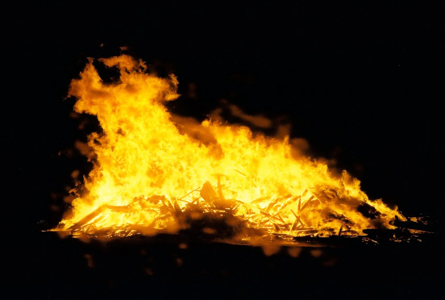 a 35mm image of a controlled burn happening at the grain elevator in Gothenburg, Nebraska.